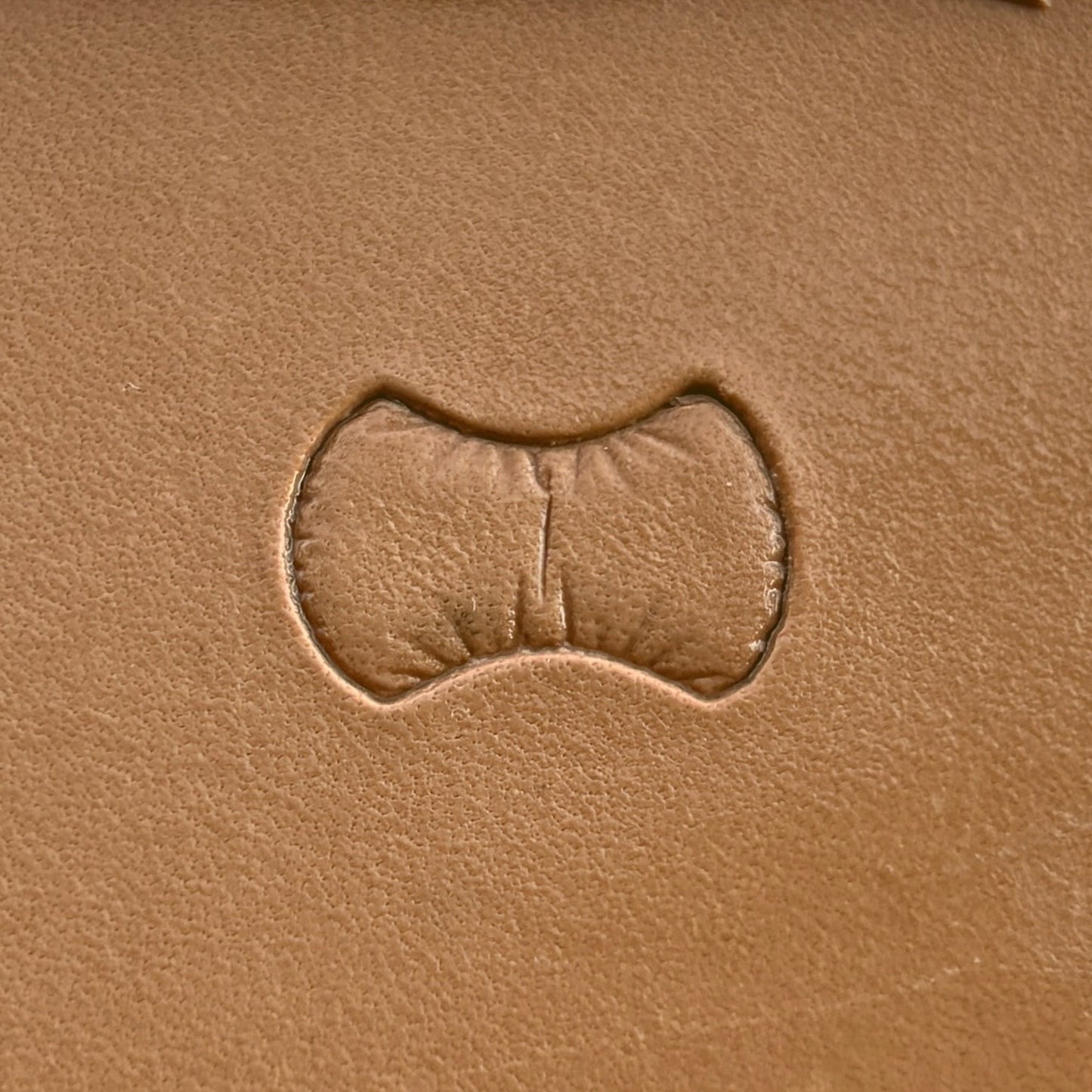 Scales leather stamp LT033 — single impression on veg-tan leather
