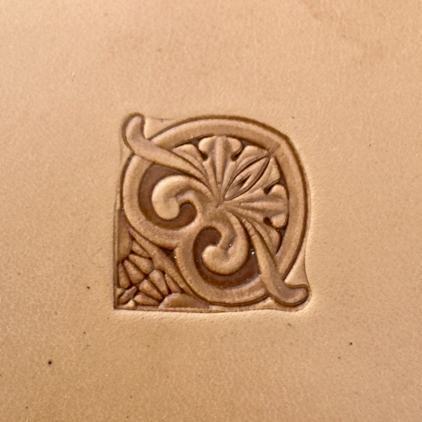 Scrollwork Border leather stamp LT071 — single impression on veg-tan leather