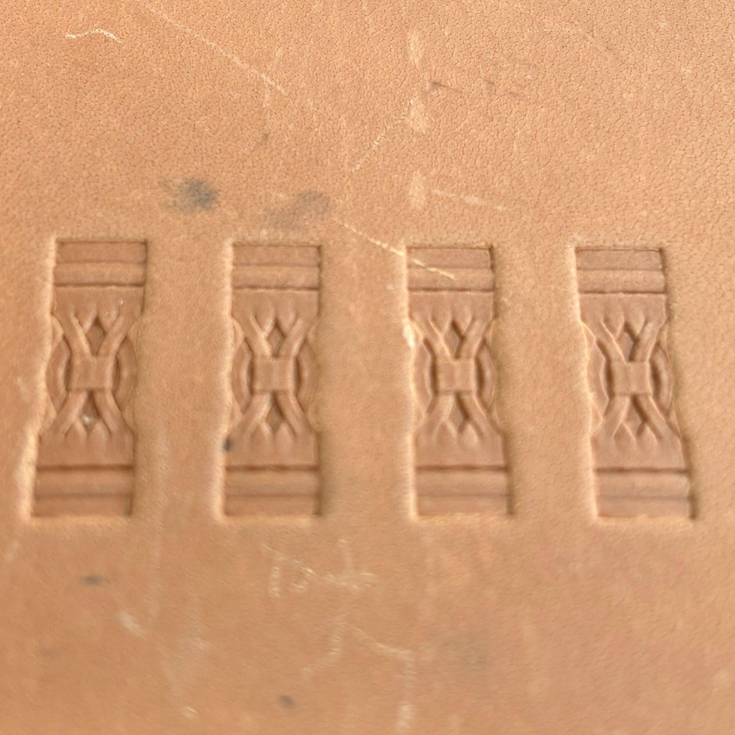 Geometric leather stamp LT088 — single impression on veg-tan leather
