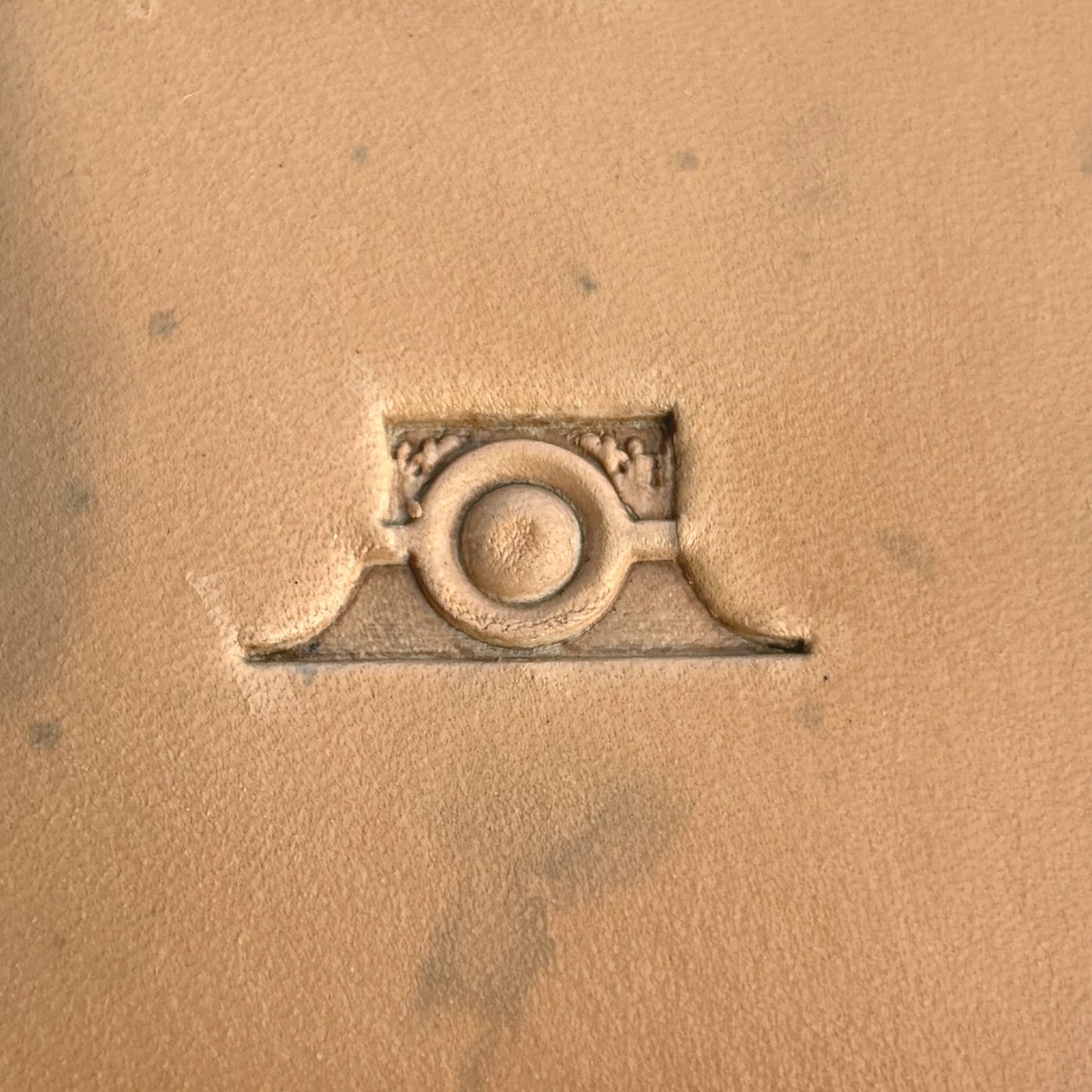 Geometric leather stamp LT111 — single impression on veg-tan leather