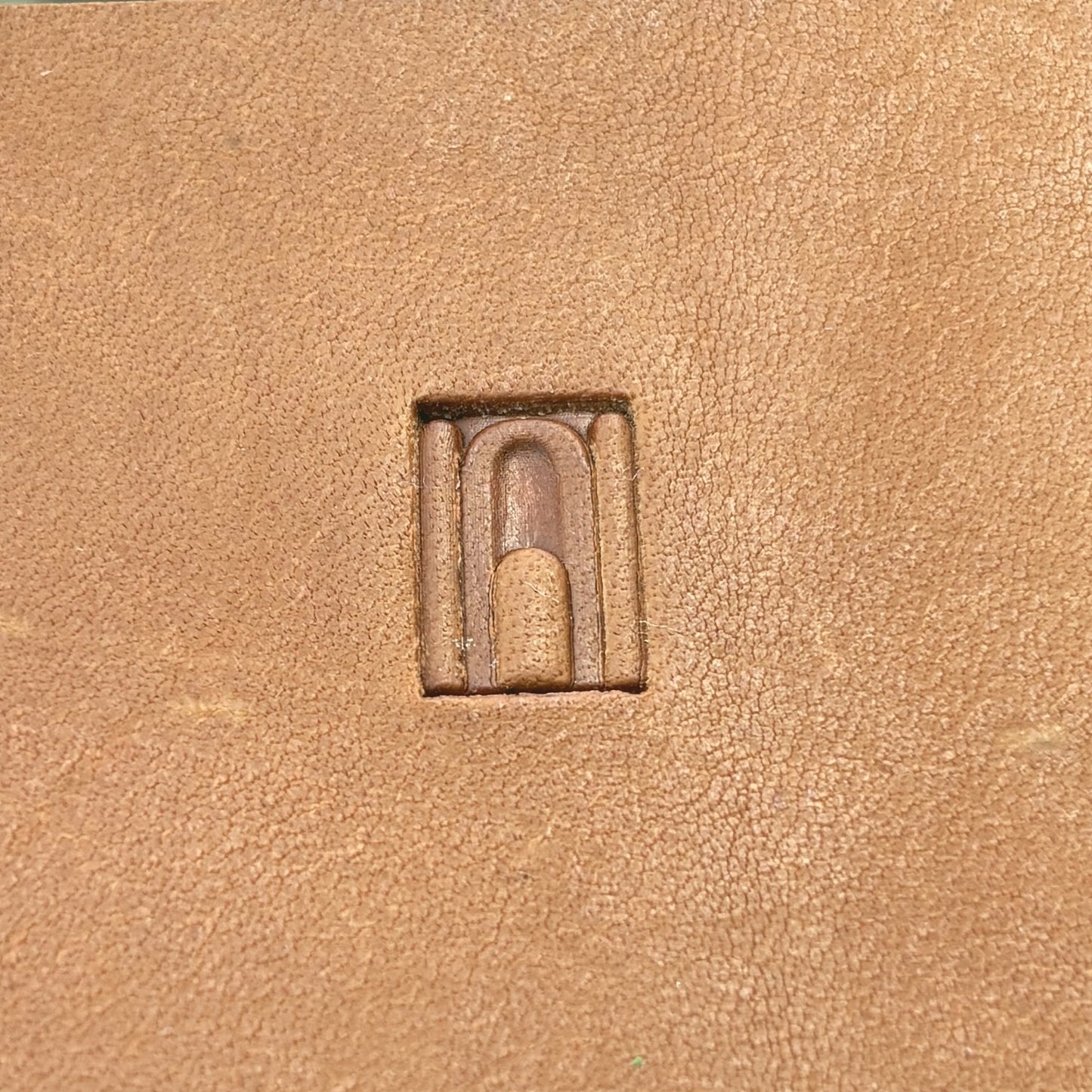 Arch Border Geometric leather stamp LT137 — pattern imprint on veg-tan leather