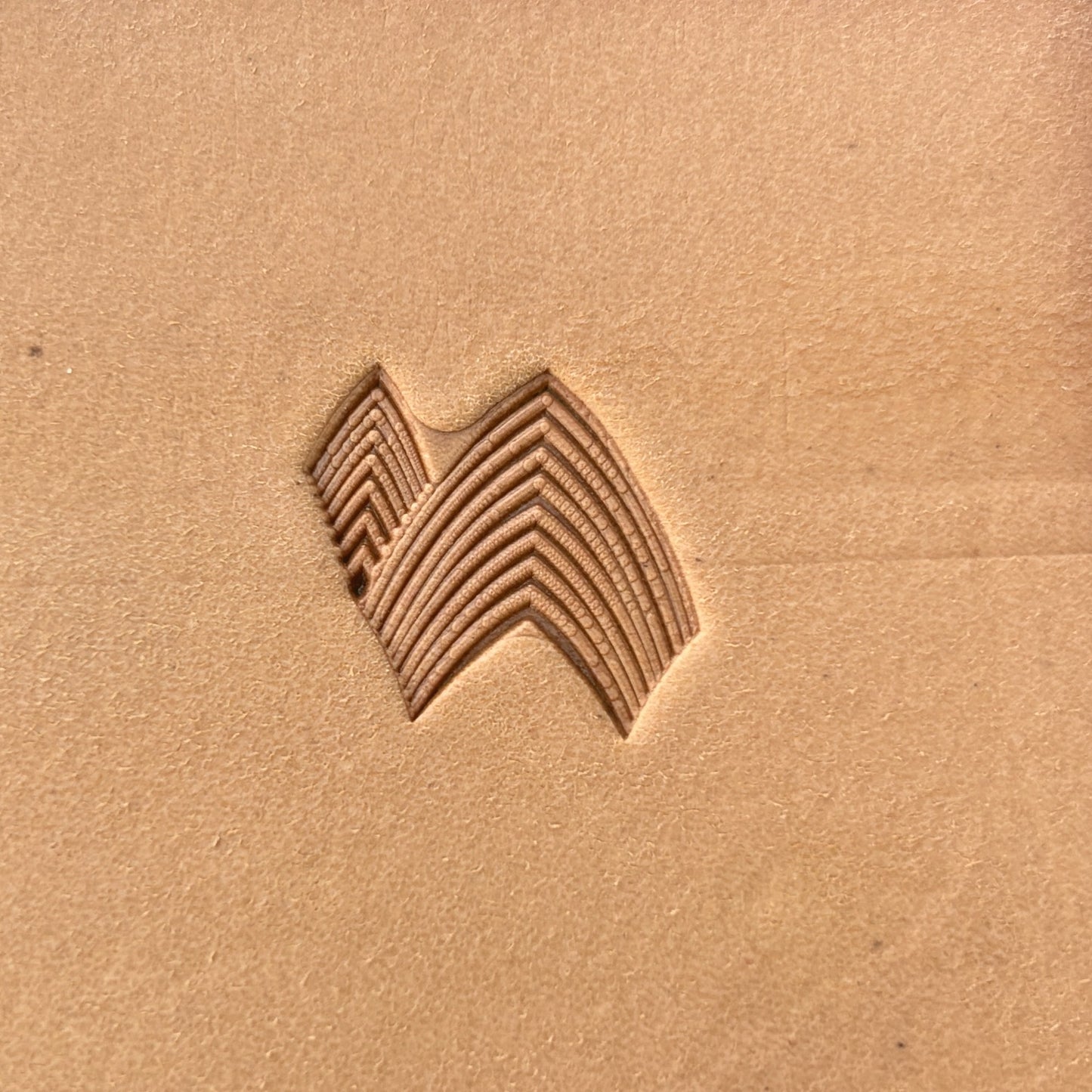 Layered Chevron Geometric leather stamp LT141 — single impression on veg-tan leather