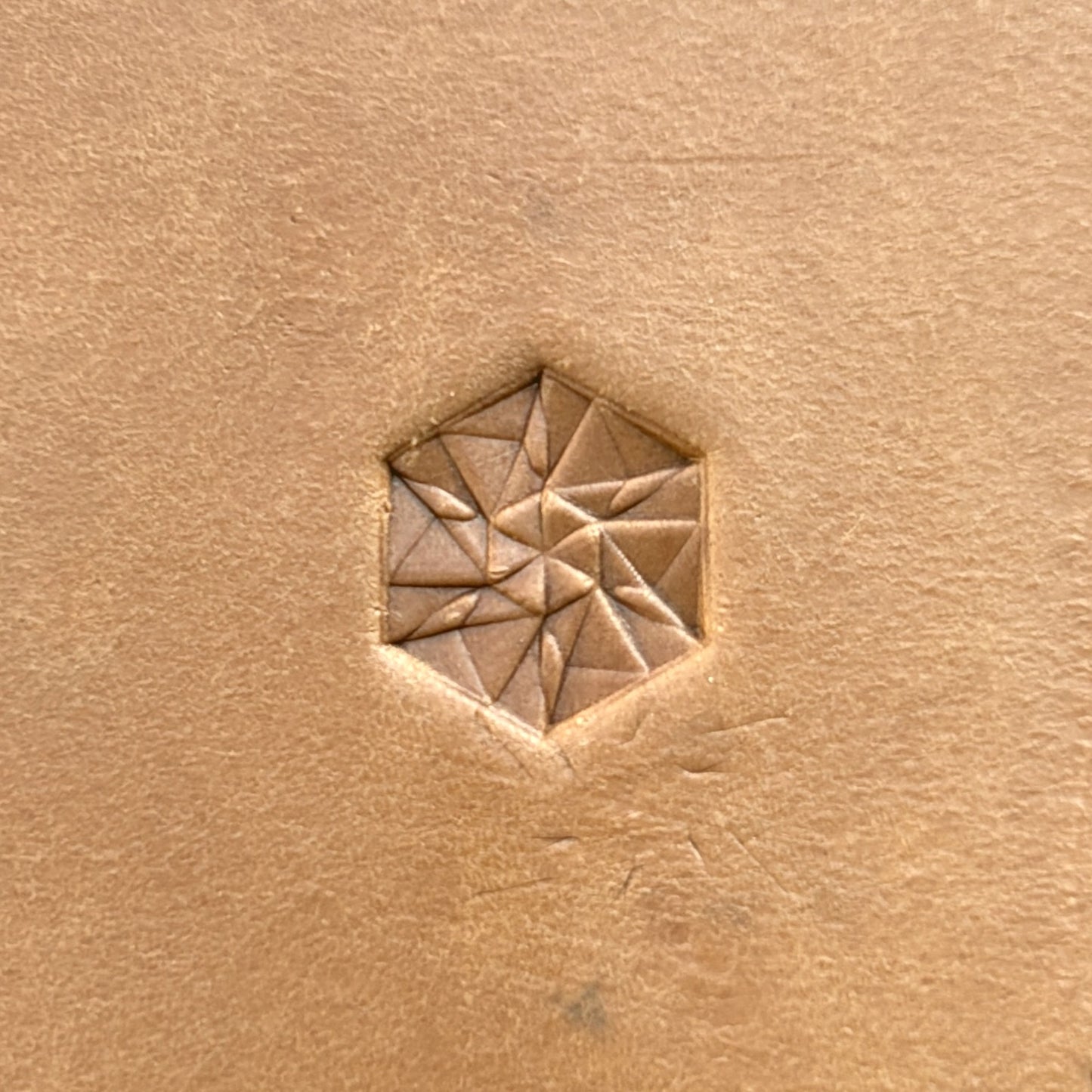 Hex Mosaic Geometric leather stamp LT177 — single impression on veg-tan leather
