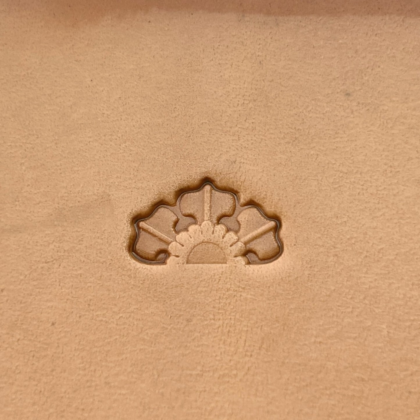 Fan Border leather stamp LT189 — single impression on veg-tan leather