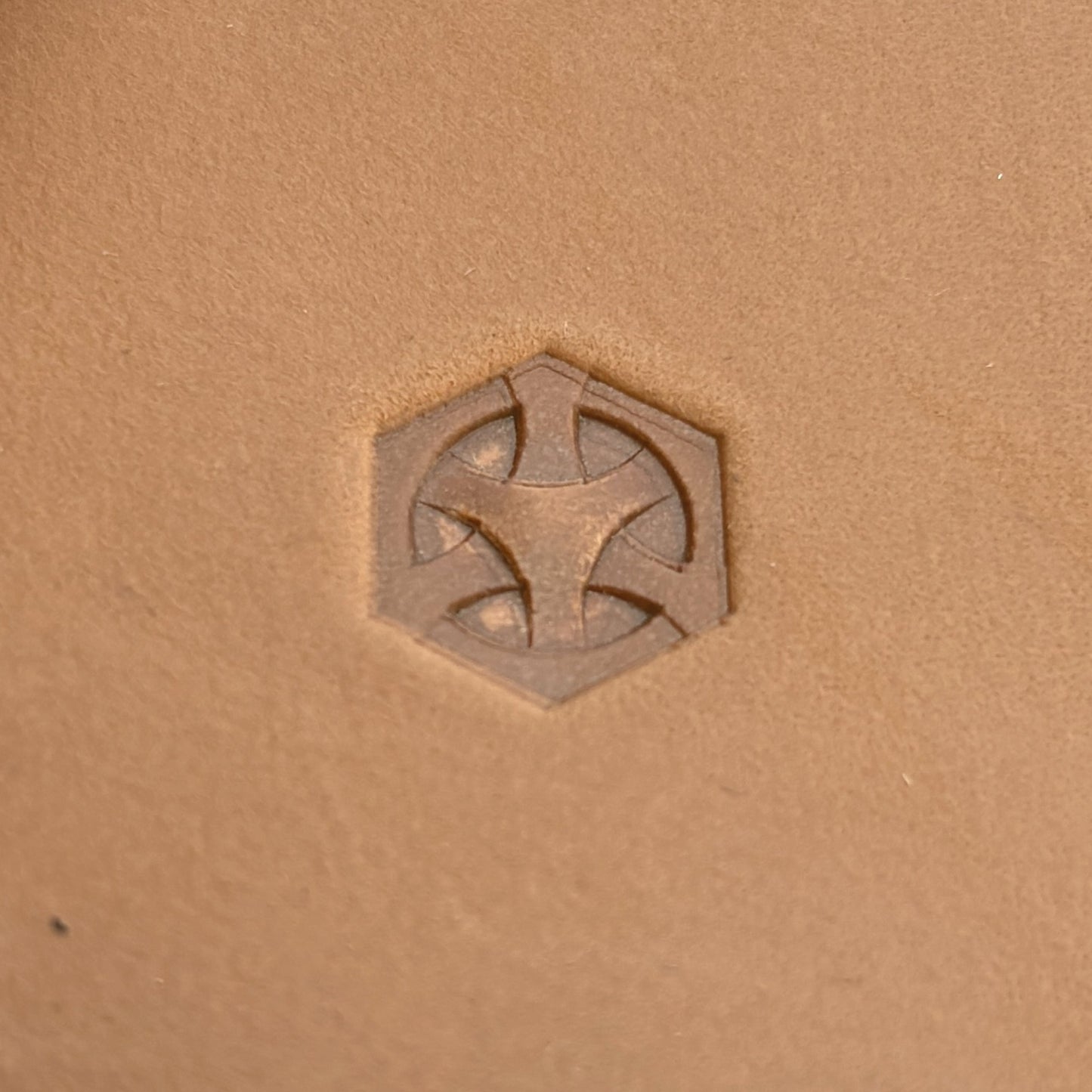Geometric leather stamp LT209 — single impression on veg-tan leather