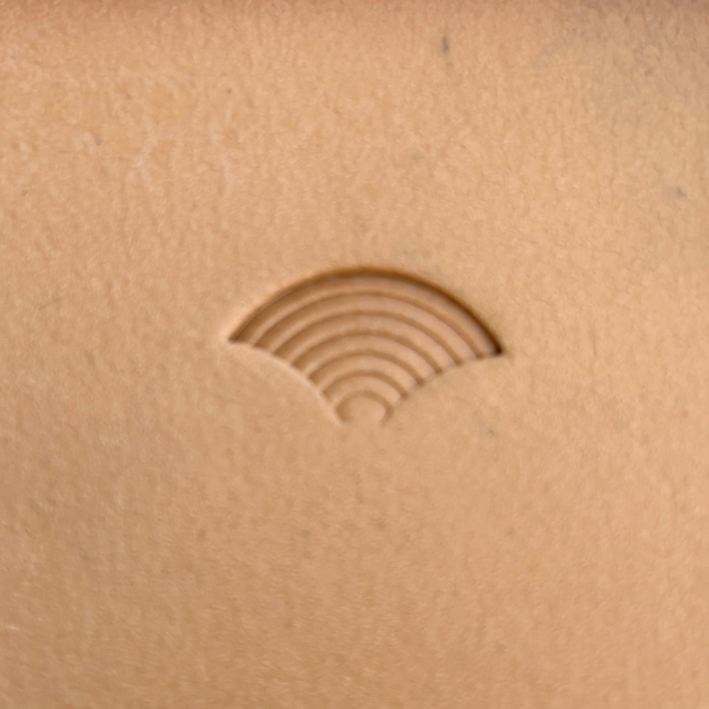Seigaiha Waves 1 leather stamp LT211 — single impression on veg-tan leather