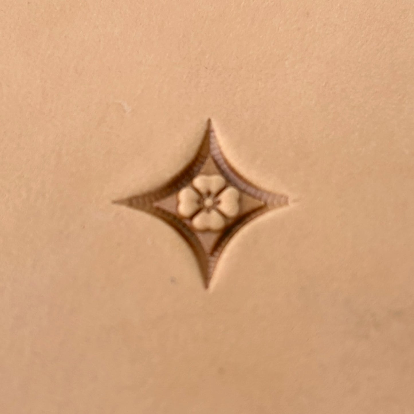 Floral Tiles Geometric leather stamp LT224 — single impression on veg-tan leather