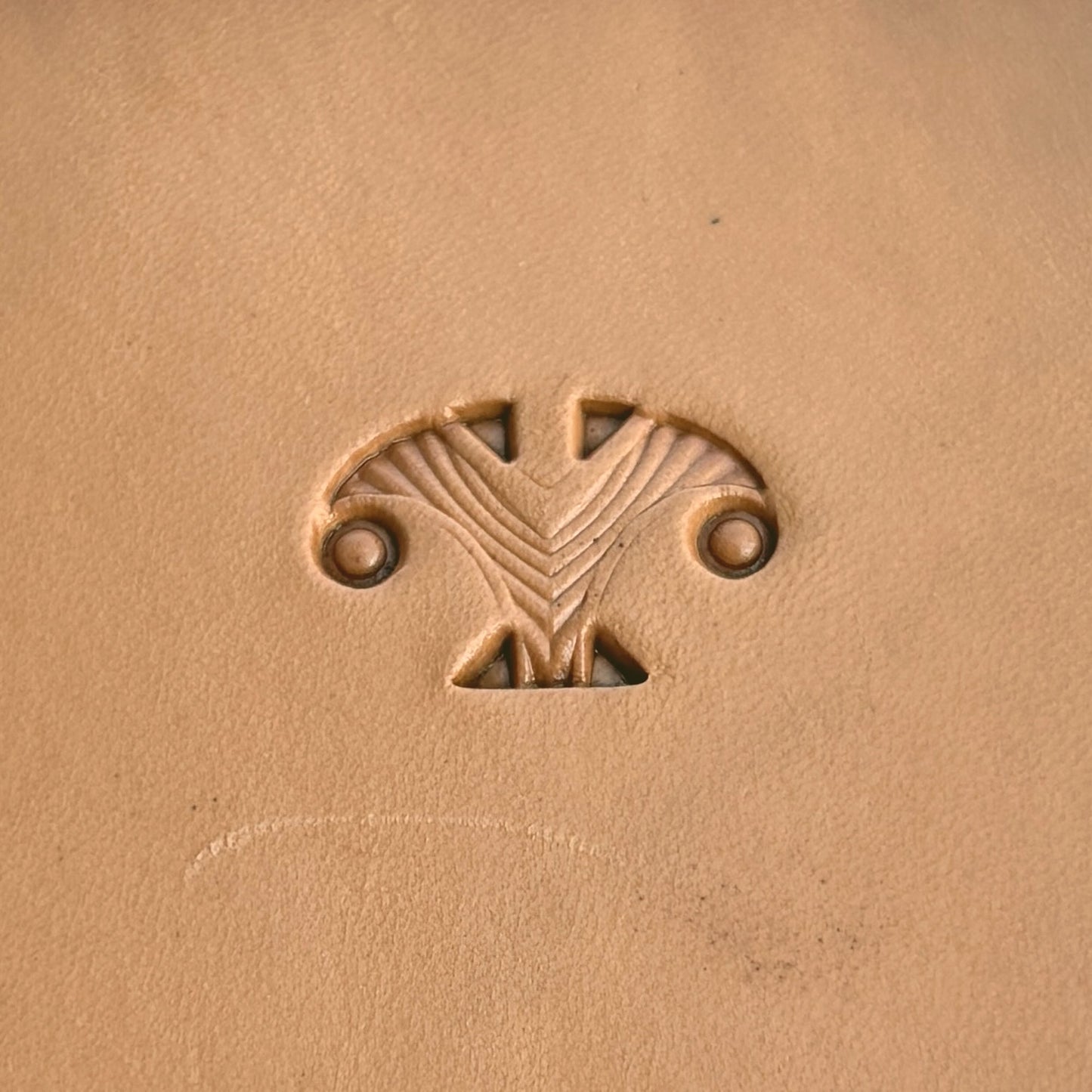 Geometric leather stamp LT237 — single impression on veg-tan leather