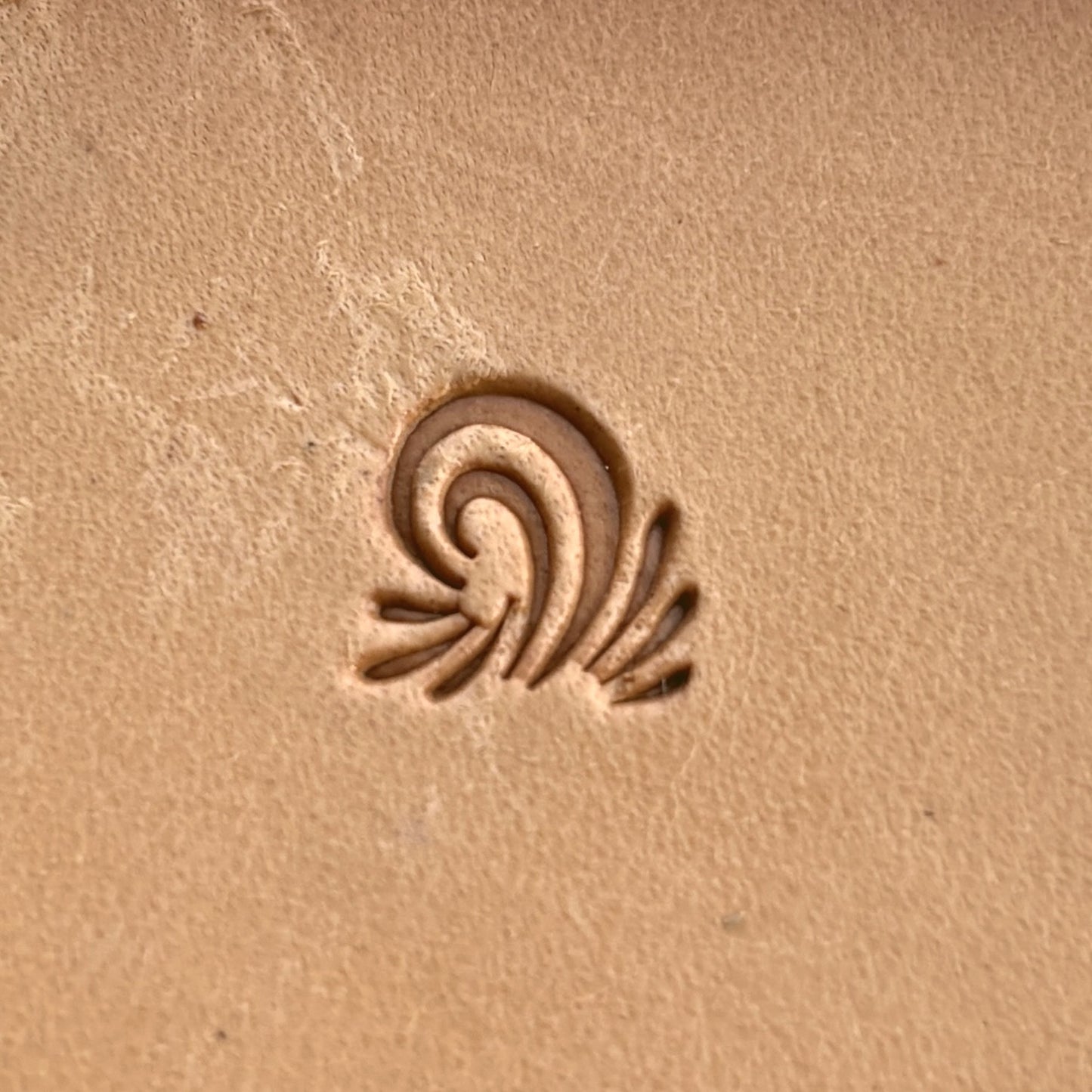 Geometric leather stamp LT263 — single impression on veg-tan leather