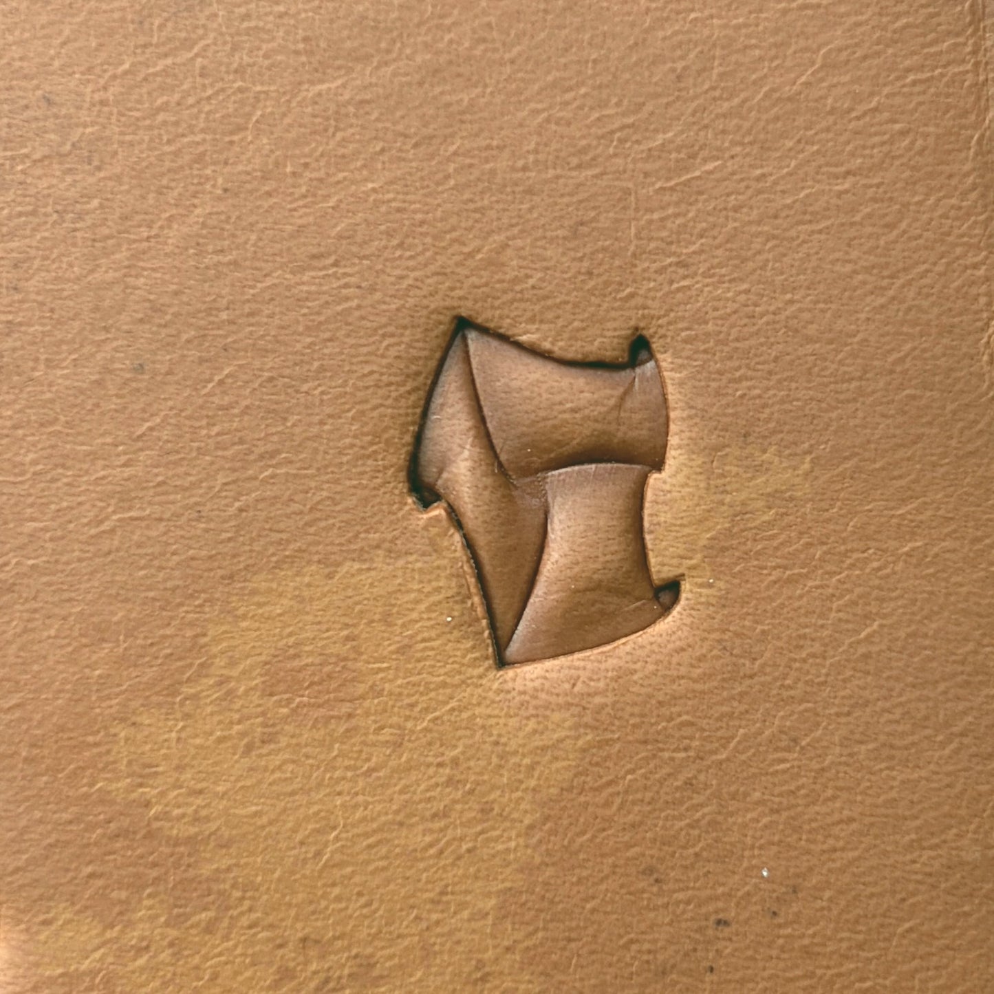 Twisted Shape Geometric leather stamp LT290 — single impression on veg-tan leather