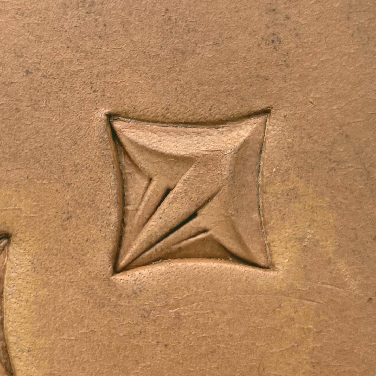 Star Shape Geometric leather stamp LT305 — single impression on veg-tan leather