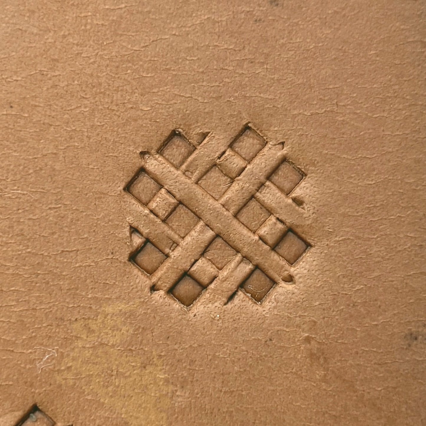 Diamond Grid Basket Weave leather stamp LT306 — single impression on veg-tan leather
