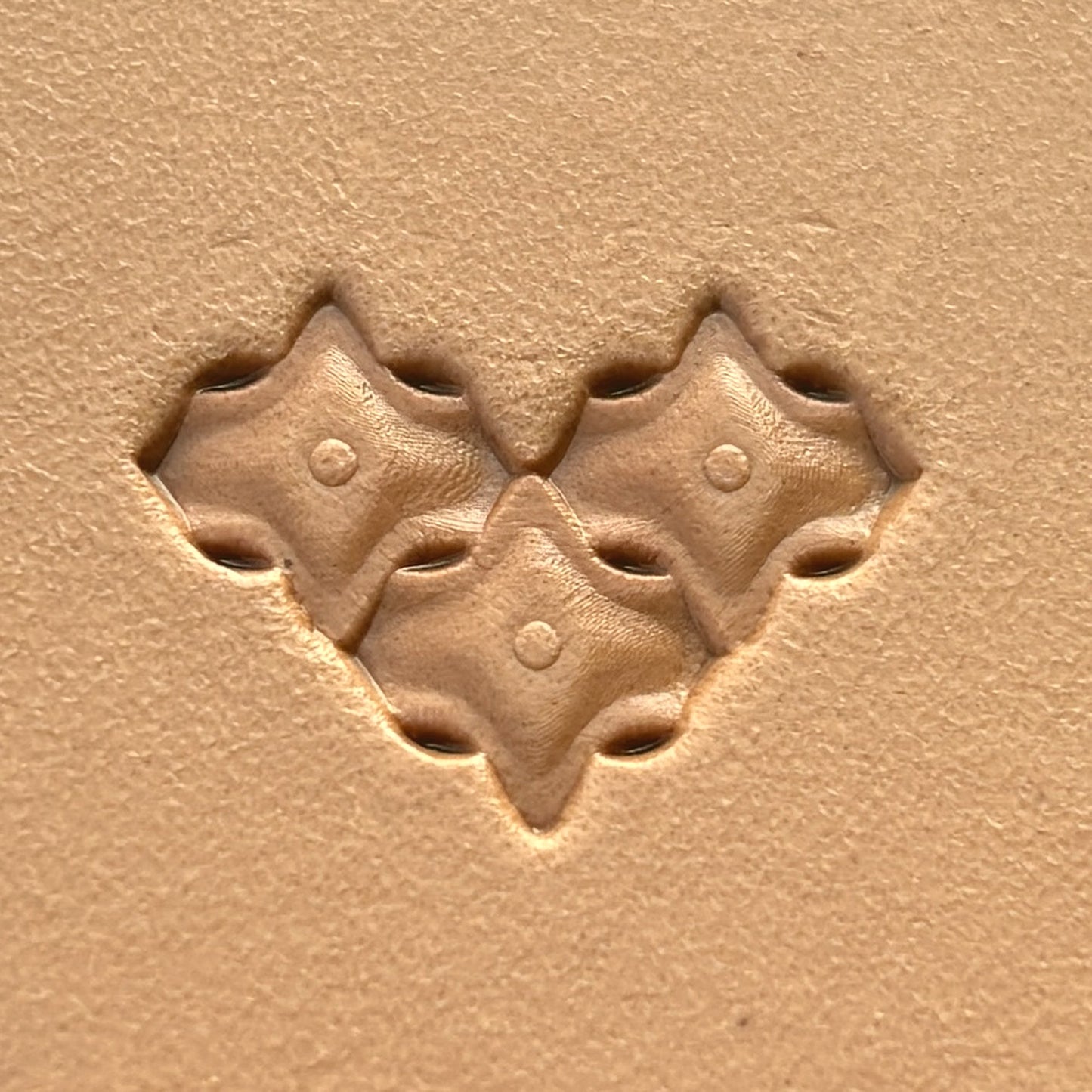 Diamond Tiles leather stamp LT319 — single impression on veg-tan leather
