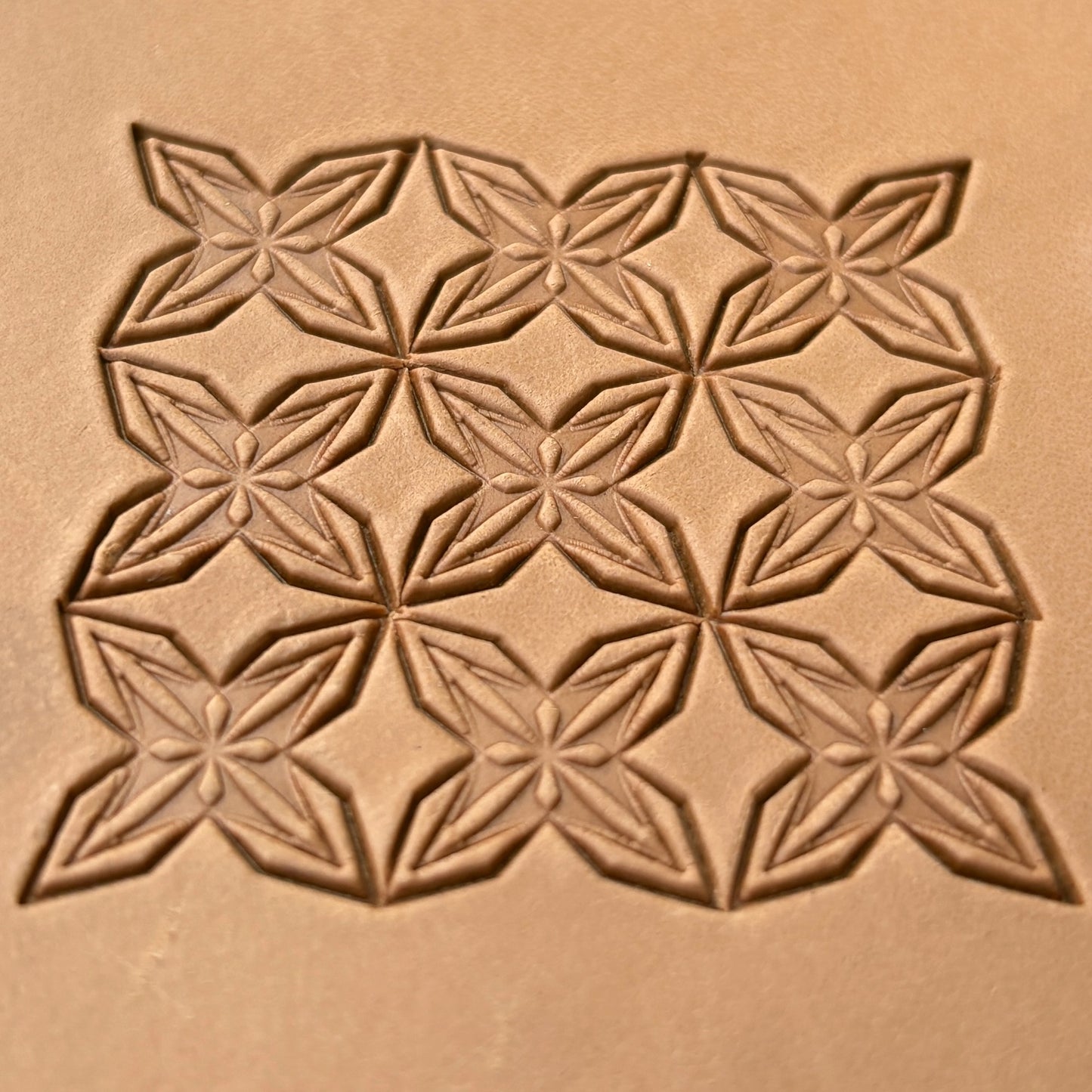 Star Mosaic Geometric leather stamp LT324 — single impression on veg-tan leather