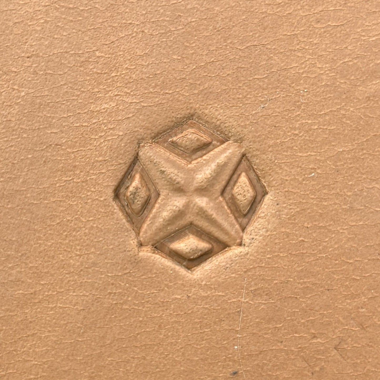 Diamond Cross Geometric leather stamp LT349 — single impression on veg-tan leather