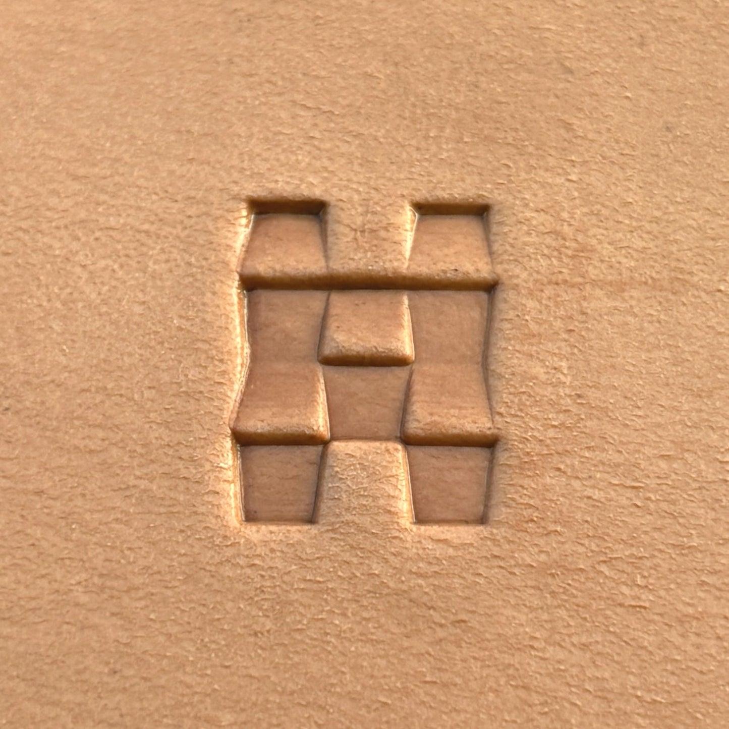 Basket Weave leather stamp LT361 — single impression on veg-tan leather