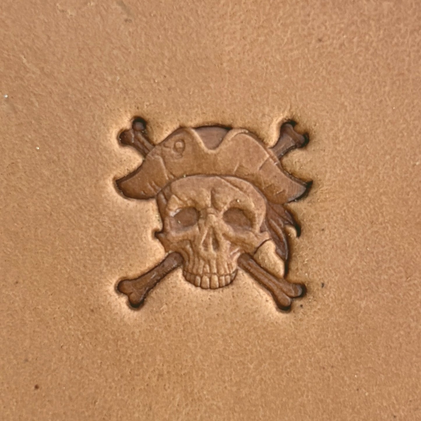 Pirate Crossbones Skull leather stamp LT557 — single impression on veg-tan leather