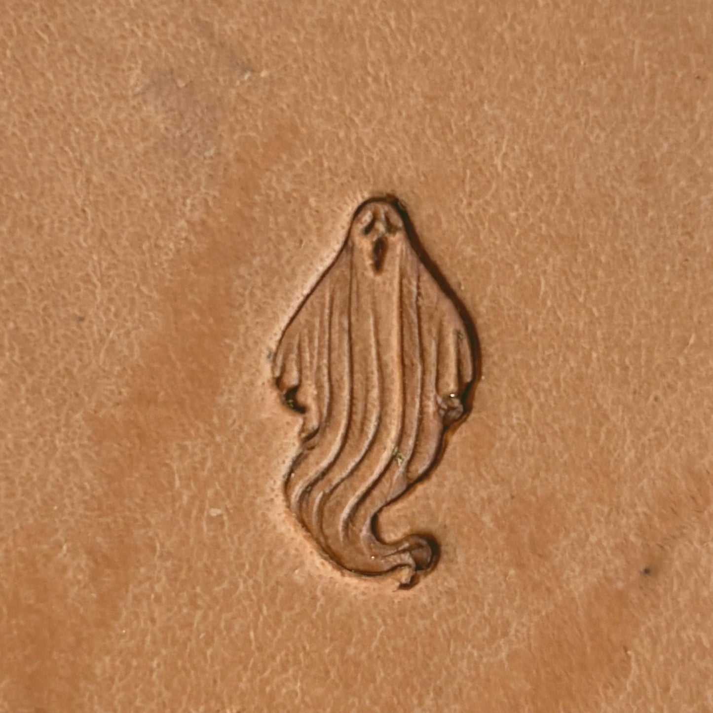 Ghost Pattern leather stamp LT585 — single impression on veg-tan leather