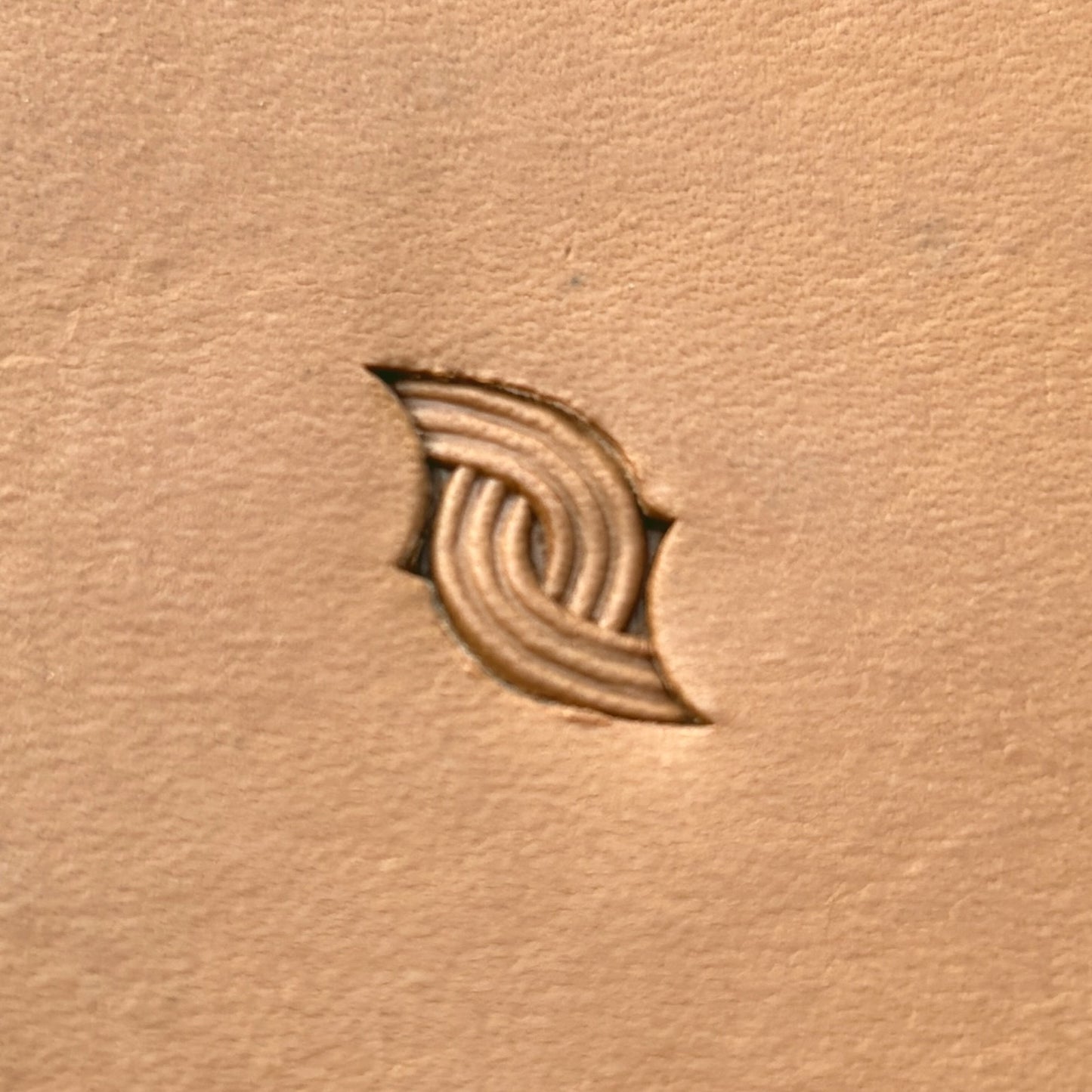 Interlock Basket Weave leather stamp LT602 — single impression on veg-tan leather
