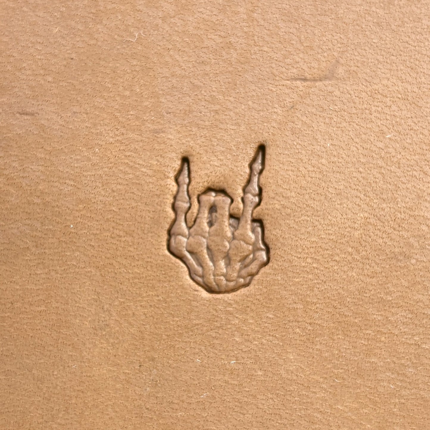 Devil Horns Hand Skull leather stamp LT723 — single impression on veg-tan leather