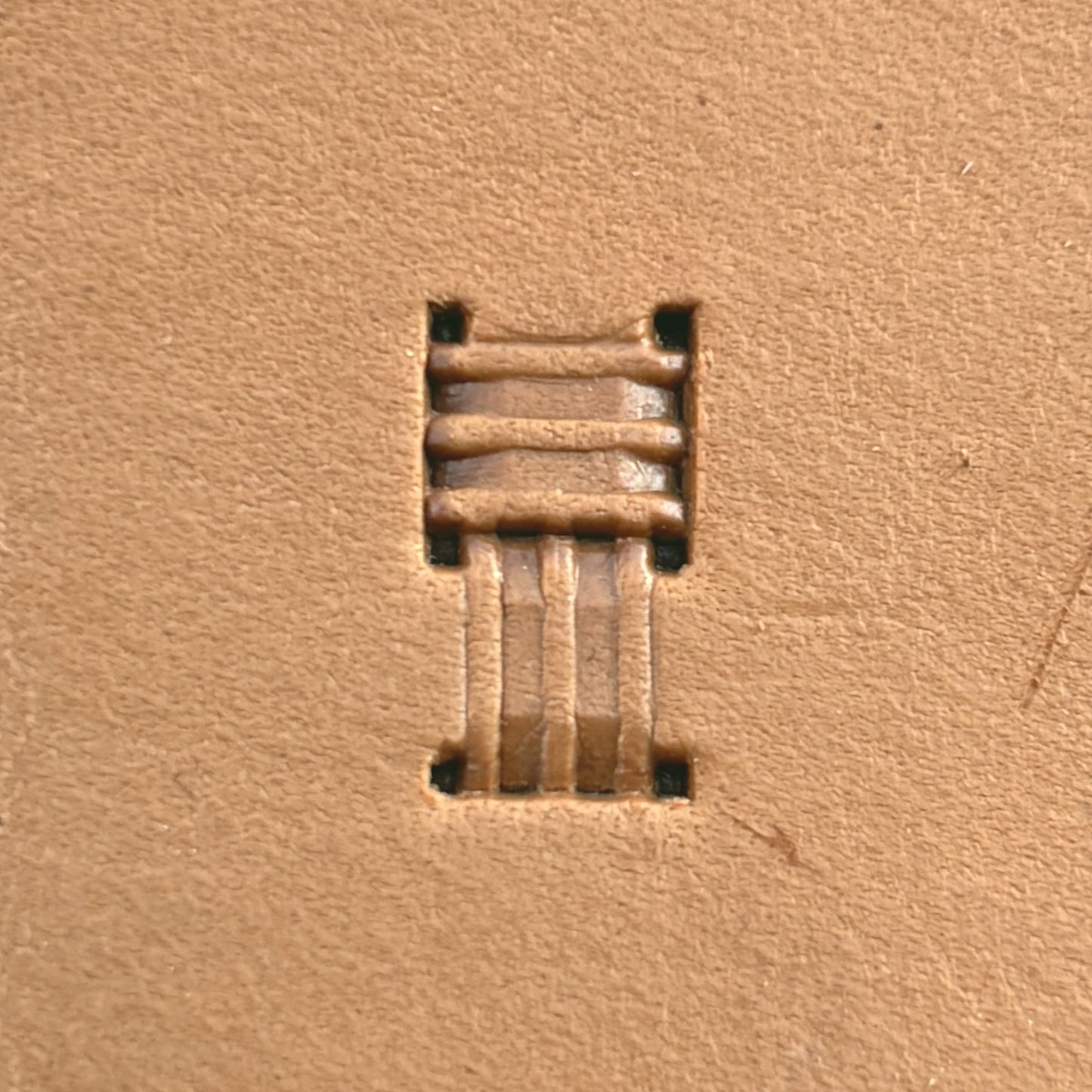 Basket Weave leather stamp LT777 — single impression on veg-tan leather