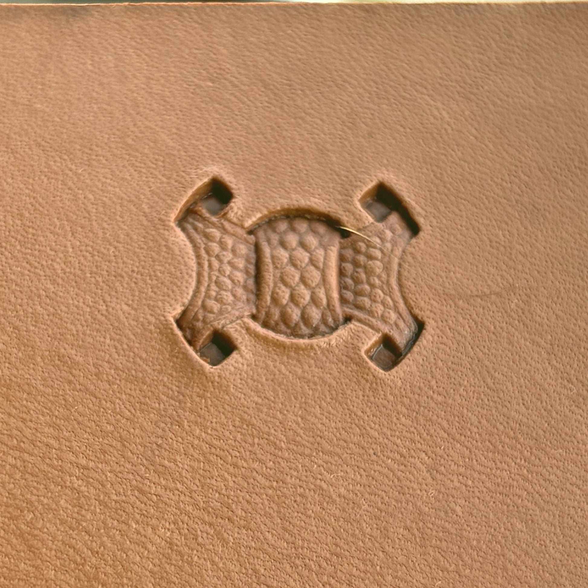 Basket Weave leather stamp LT001 — single impression on veg-tan leather
