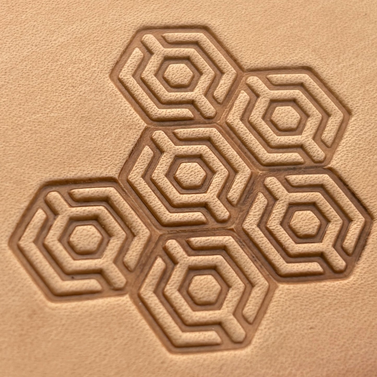 Geometric leather stamp LT003 — imprint on natural veg-tan leather