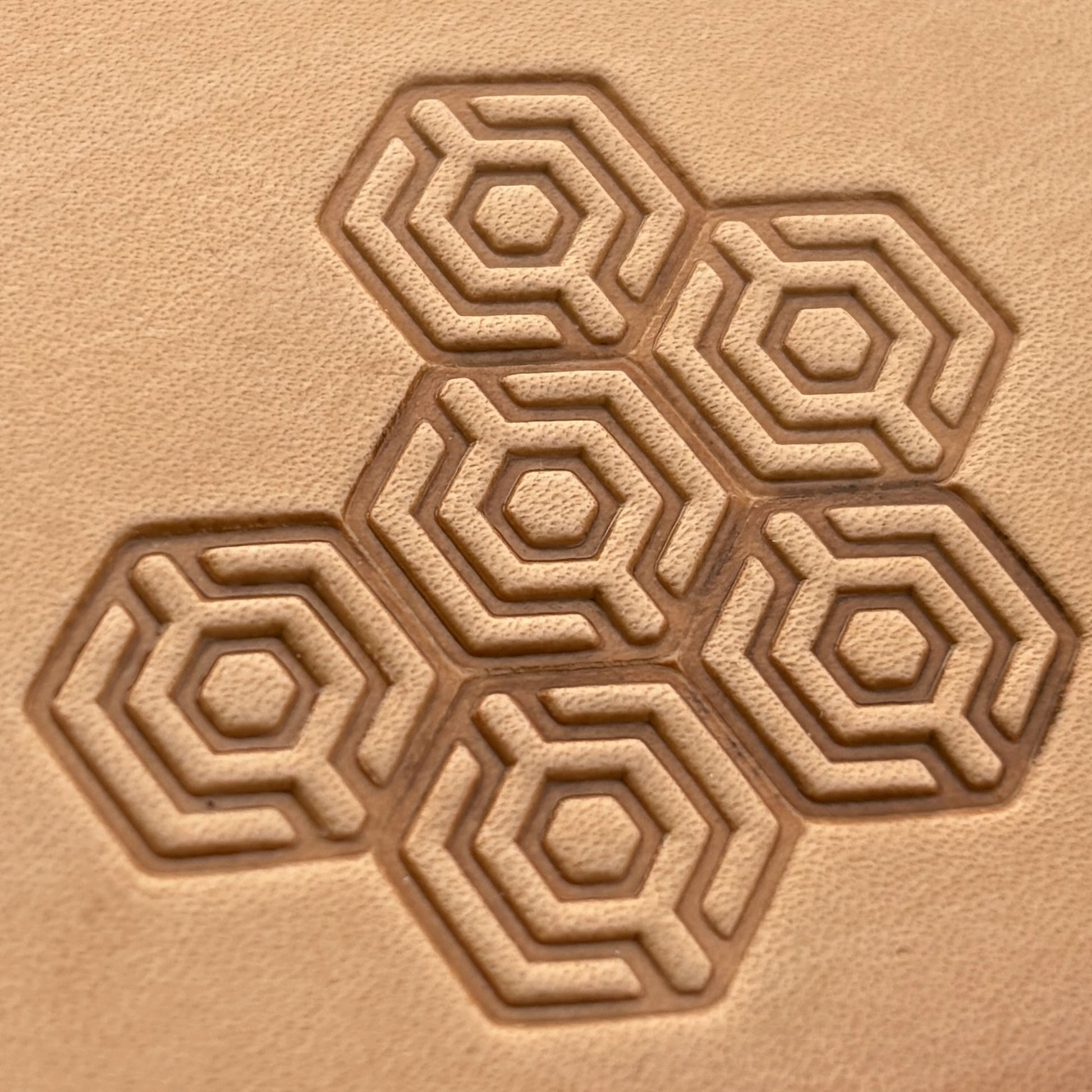 Geometric leather stamp LT003 — imprint on natural veg-tan leather