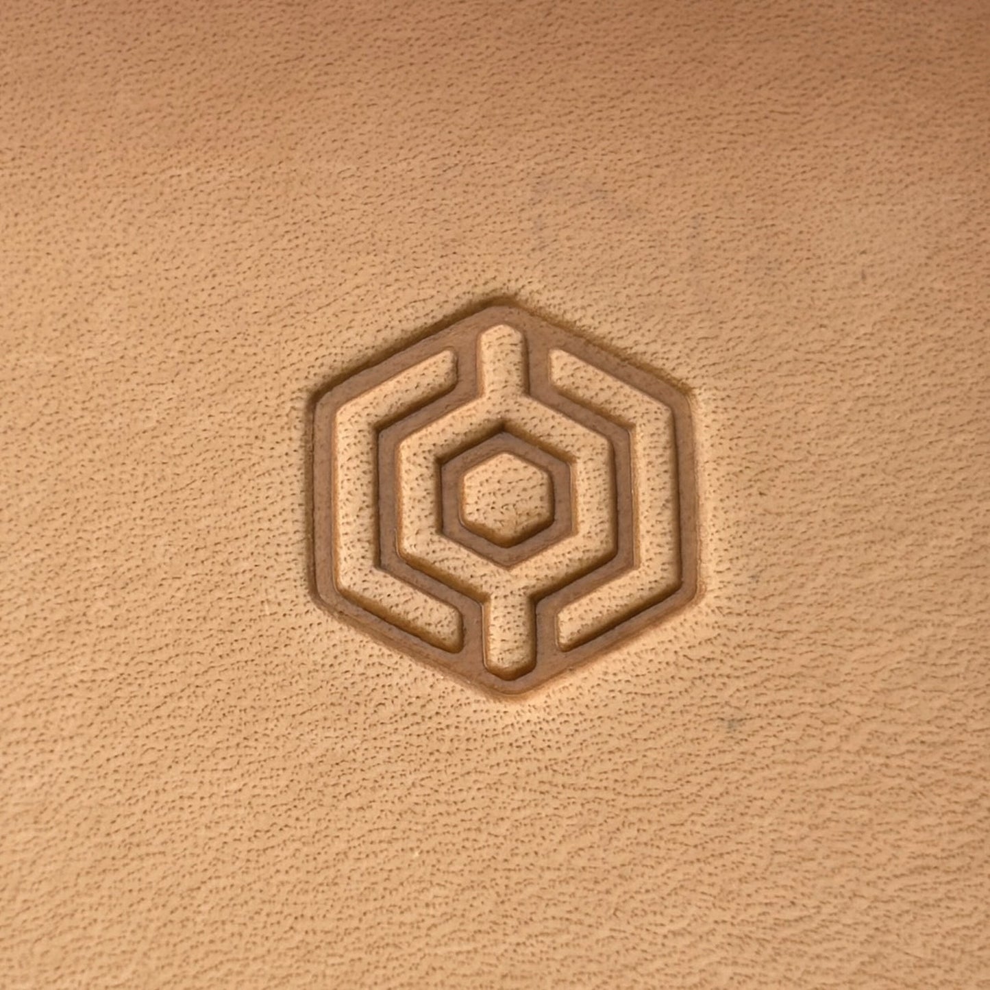 Geometric leather stamp LT003 — single impression on veg-tan leather