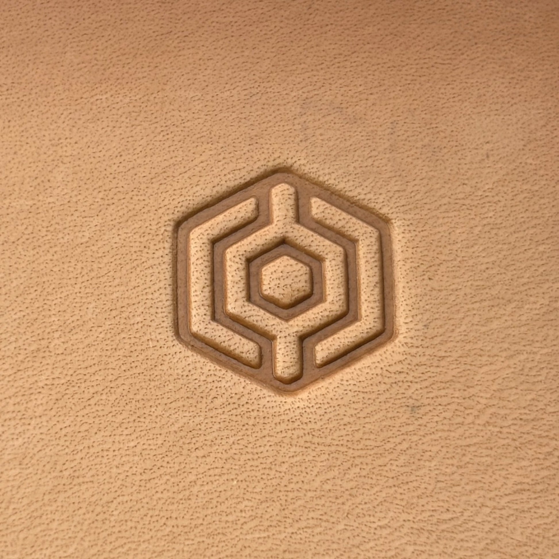 Geometric leather stamp LT003 — single impression on veg-tan leather