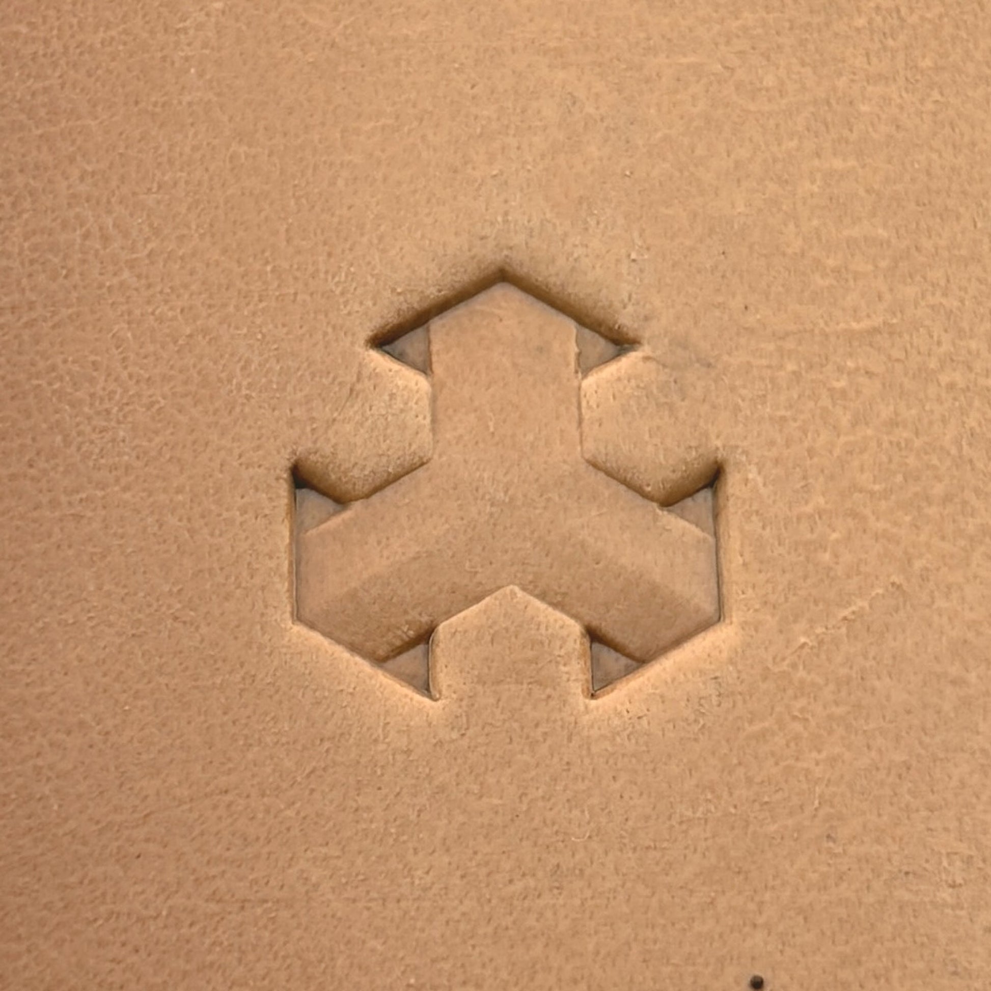 Geometric leather stamp LT004 — single impression on veg-tan leather