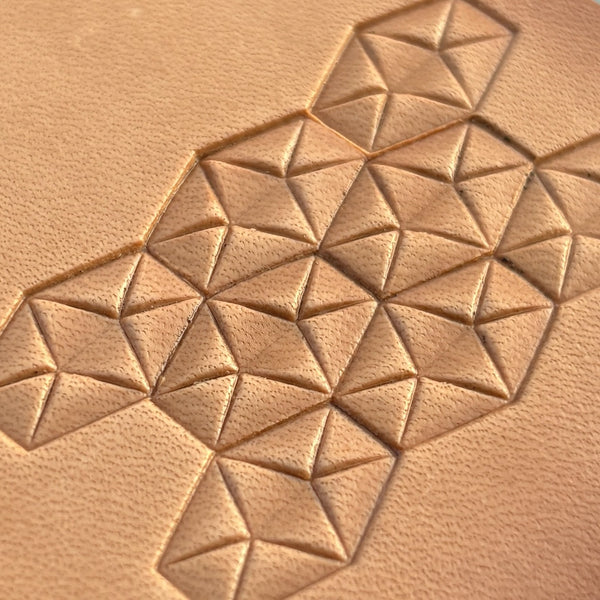 Geometric leather stamp LT007 — brass stamping tool with imprint on natural veg-tan leather