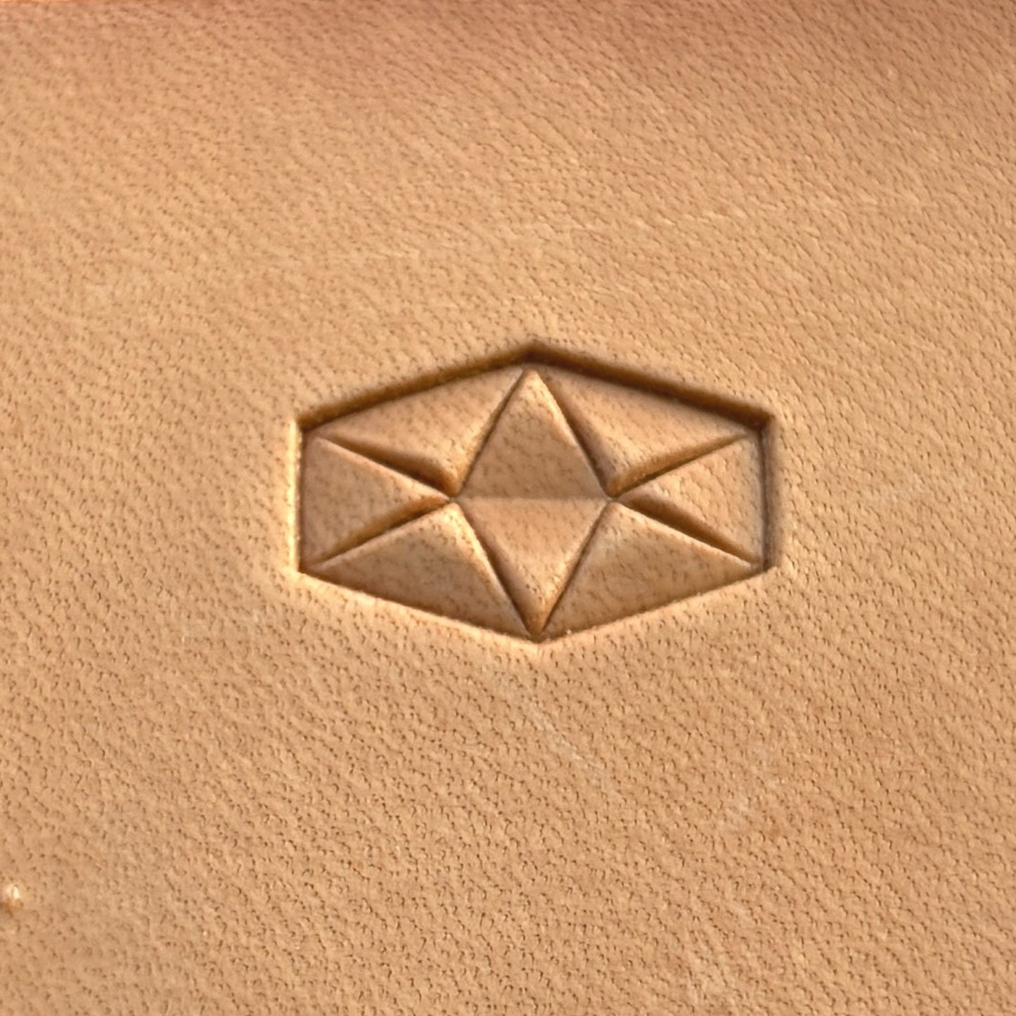 Geometric leather stamp LT007 — single impression on veg-tan leather