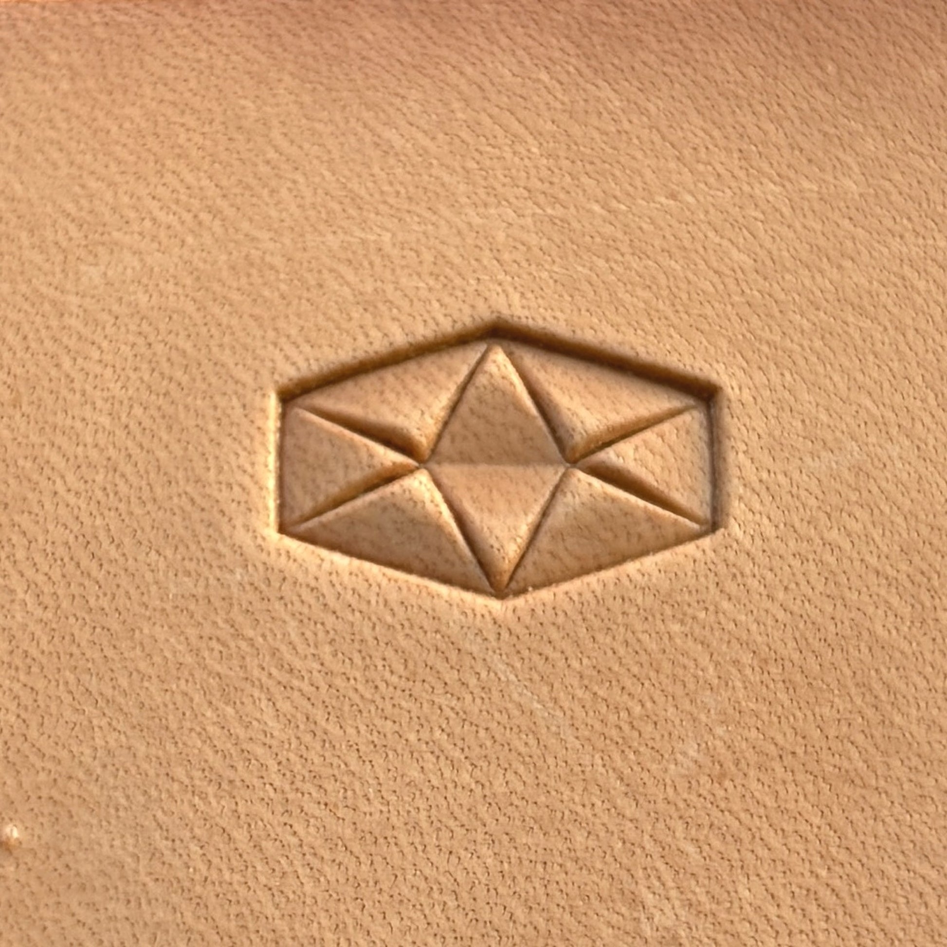 Geometric leather stamp LT007 — single impression on veg-tan leather
