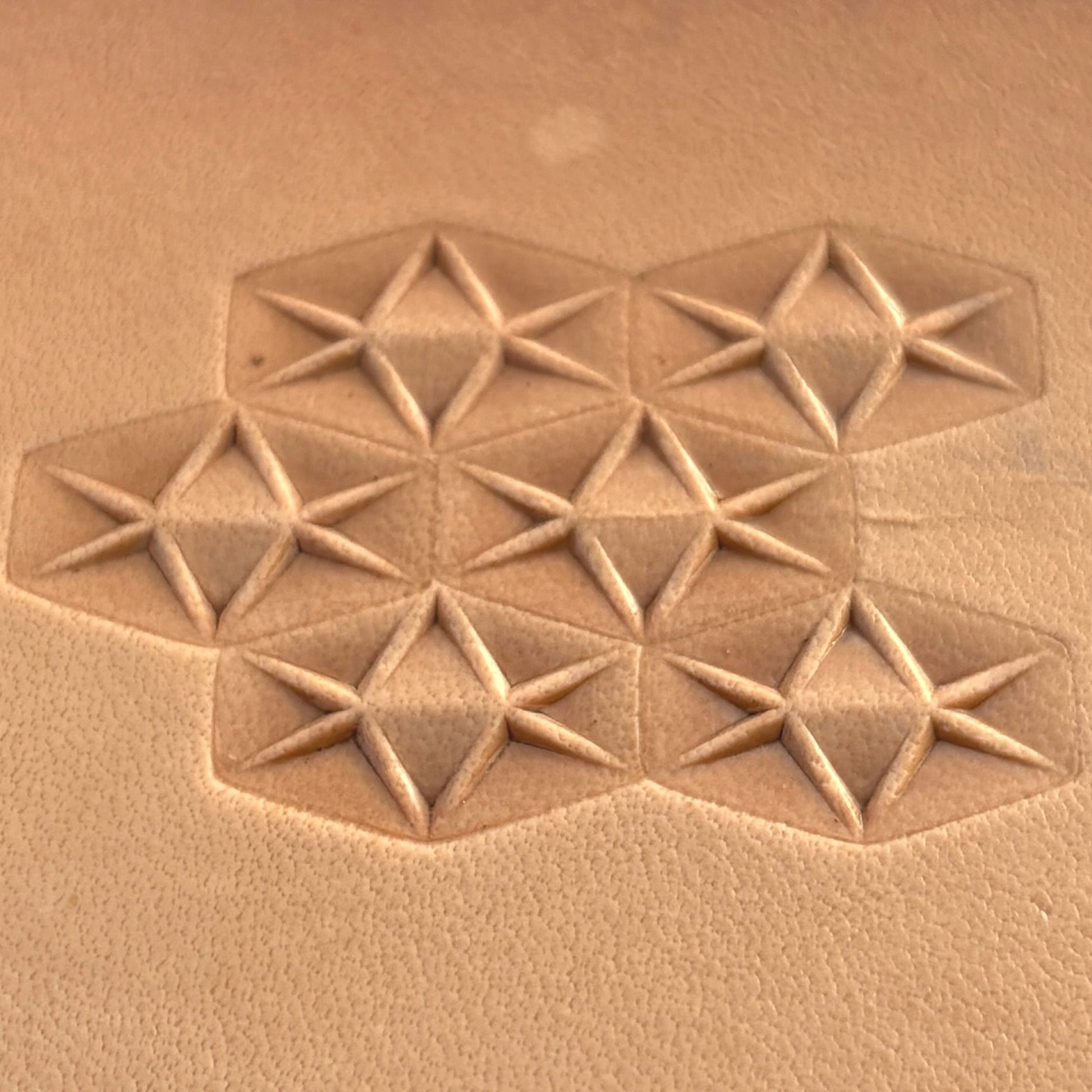 Geometric leather stamp LT008 — imprint on natural veg-tan leather