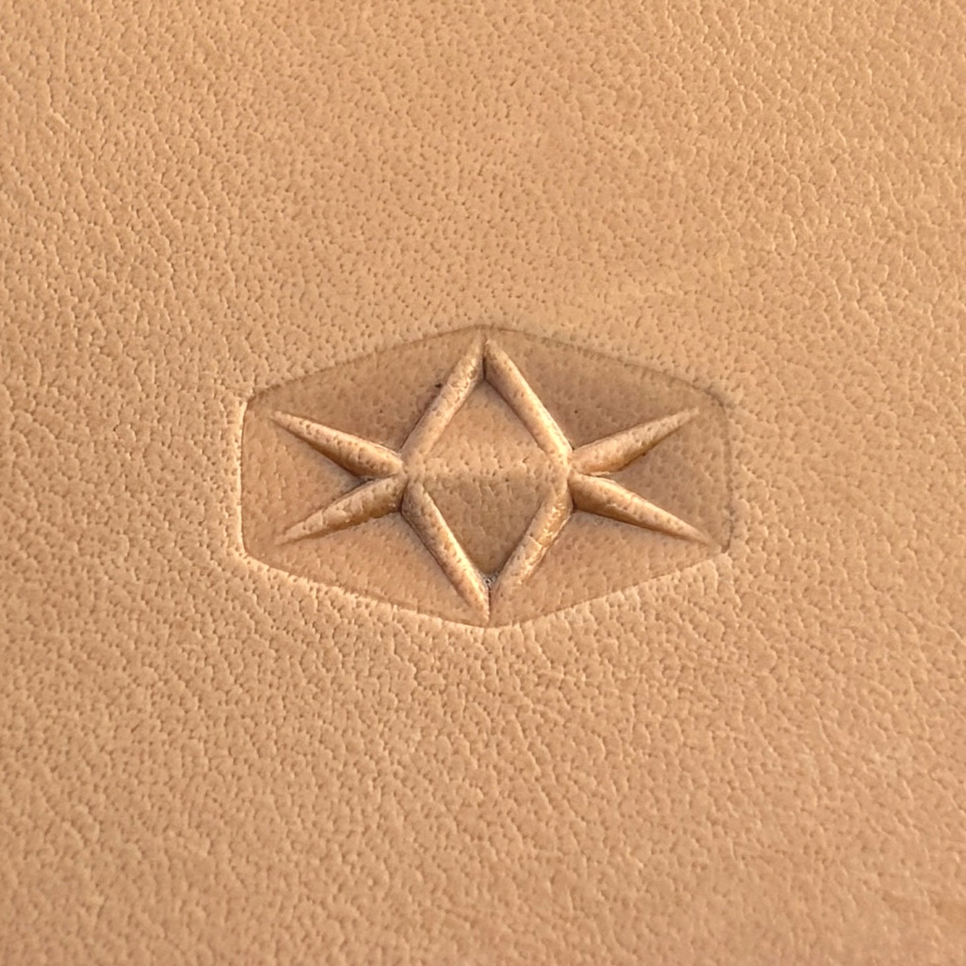 Geometric leather stamp LT008 — single impression on veg-tan leather