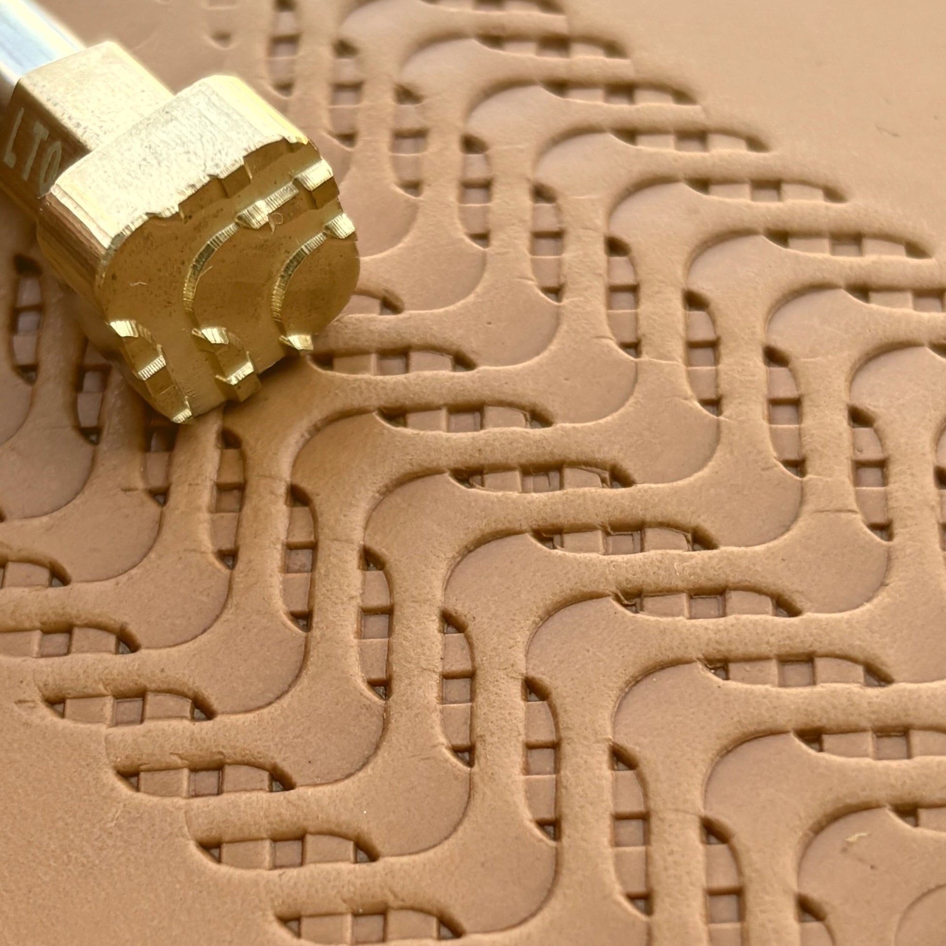 Wavy Lines leather stamp LT010 — brass stamping tool with imprint on natural veg-tan leather