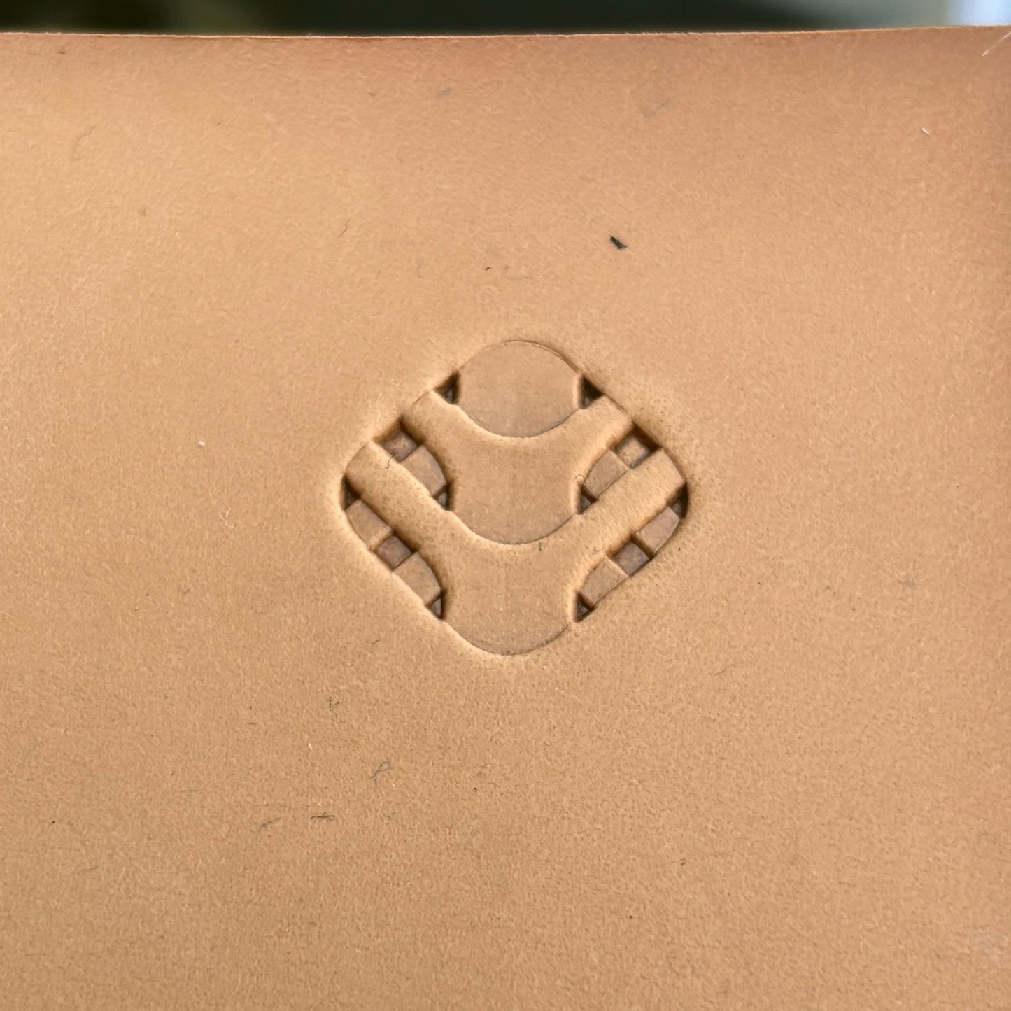 Wavy Lines leather stamp LT010 — pattern imprint on veg-tan leather