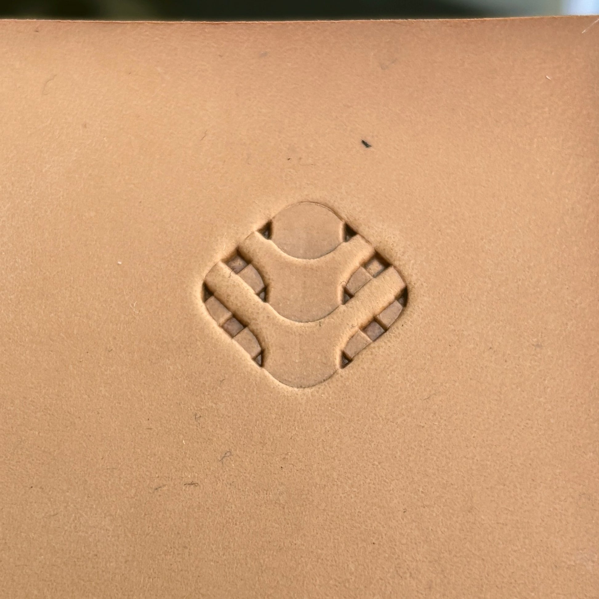 Wavy Lines leather stamp LT010 — pattern imprint on veg-tan leather