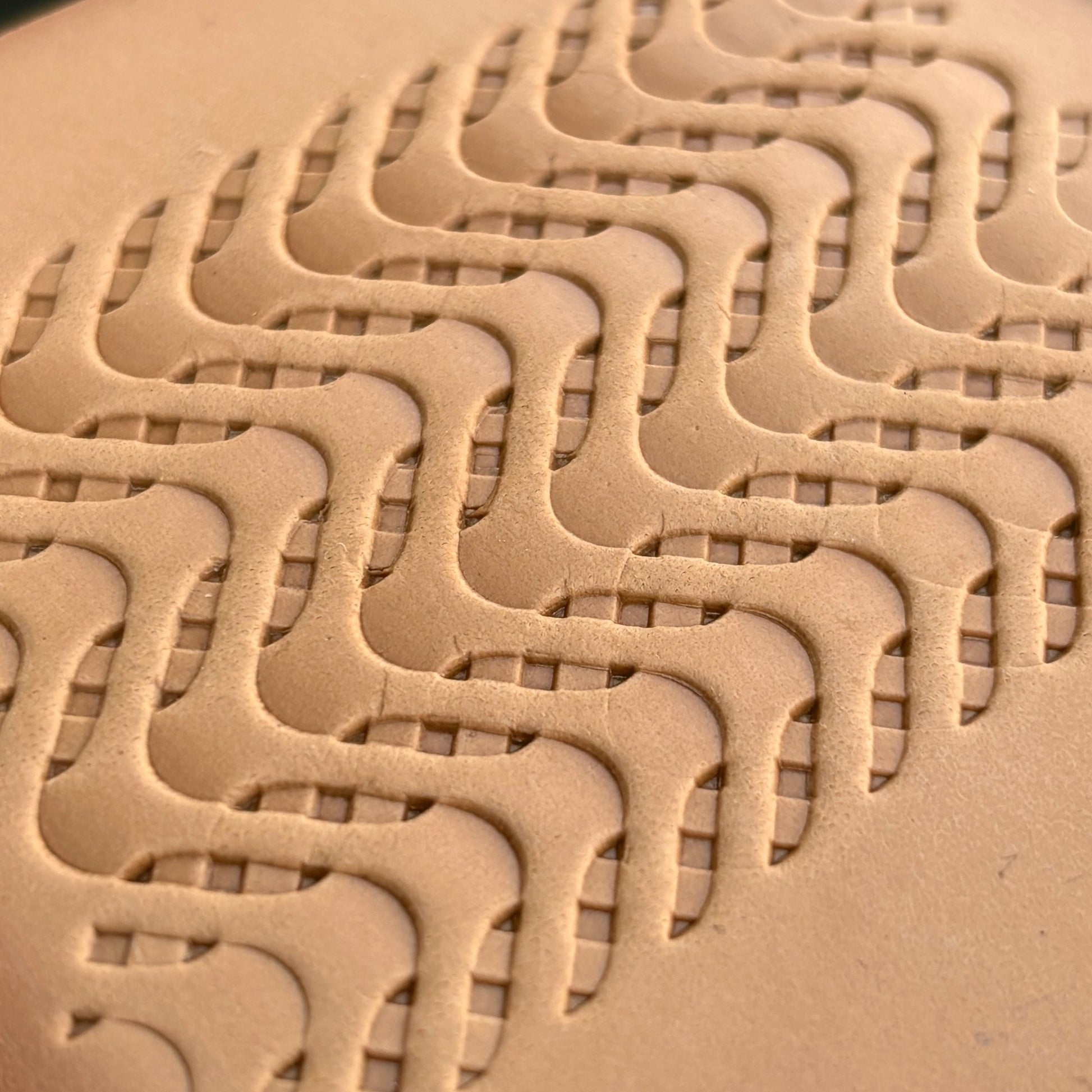 Wavy Lines leather stamp LT010 — single impression on veg-tan leather