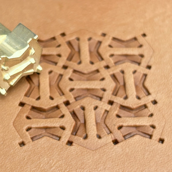 Geometric leather stamp LT013 — brass stamping tool with imprint on natural veg-tan leather