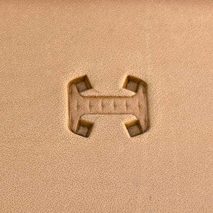 Geometric leather stamp LT020 — single impression on veg-tan leather