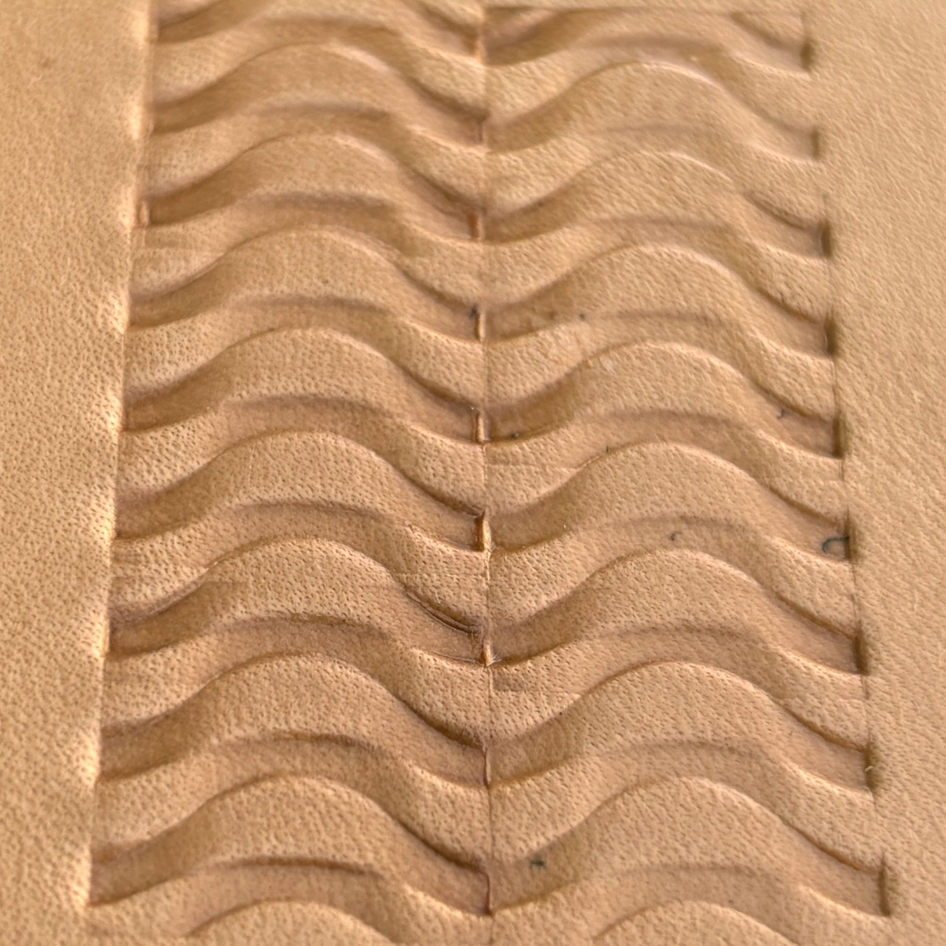 Wavy Lines leather stamp LT021 — imprint on natural veg-tan leather