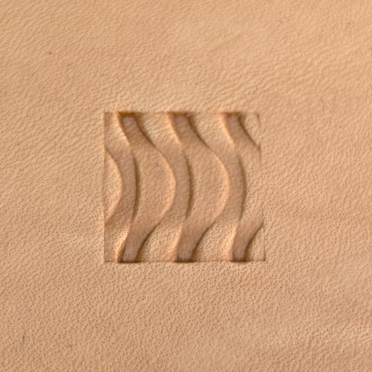 Wavy Lines leather stamp LT021 — single impression on veg-tan leather
