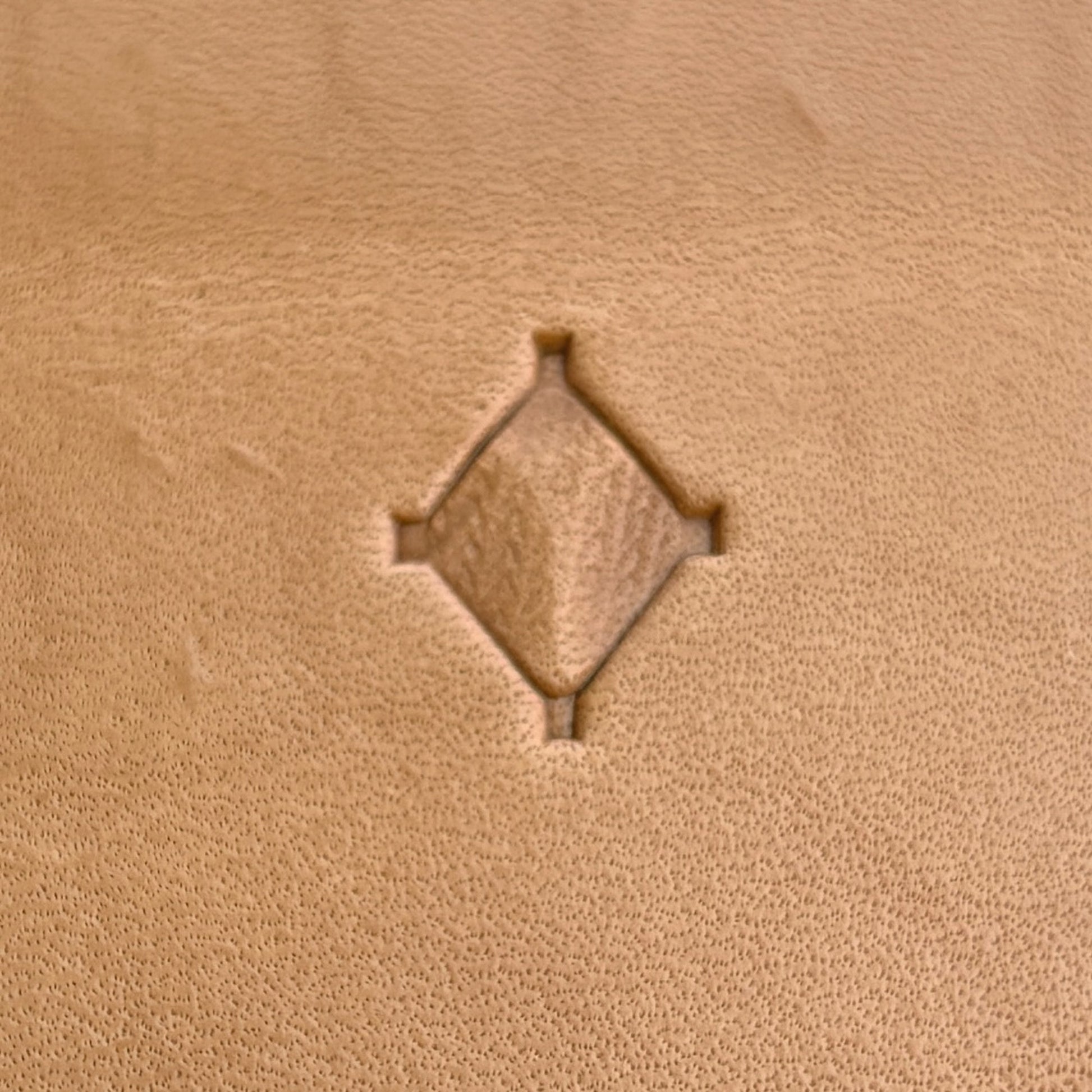 Geometric leather stamp LT024 — single impression on veg-tan leather