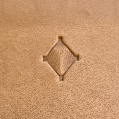 Geometric leather stamp LT024 — single impression on veg-tan leather