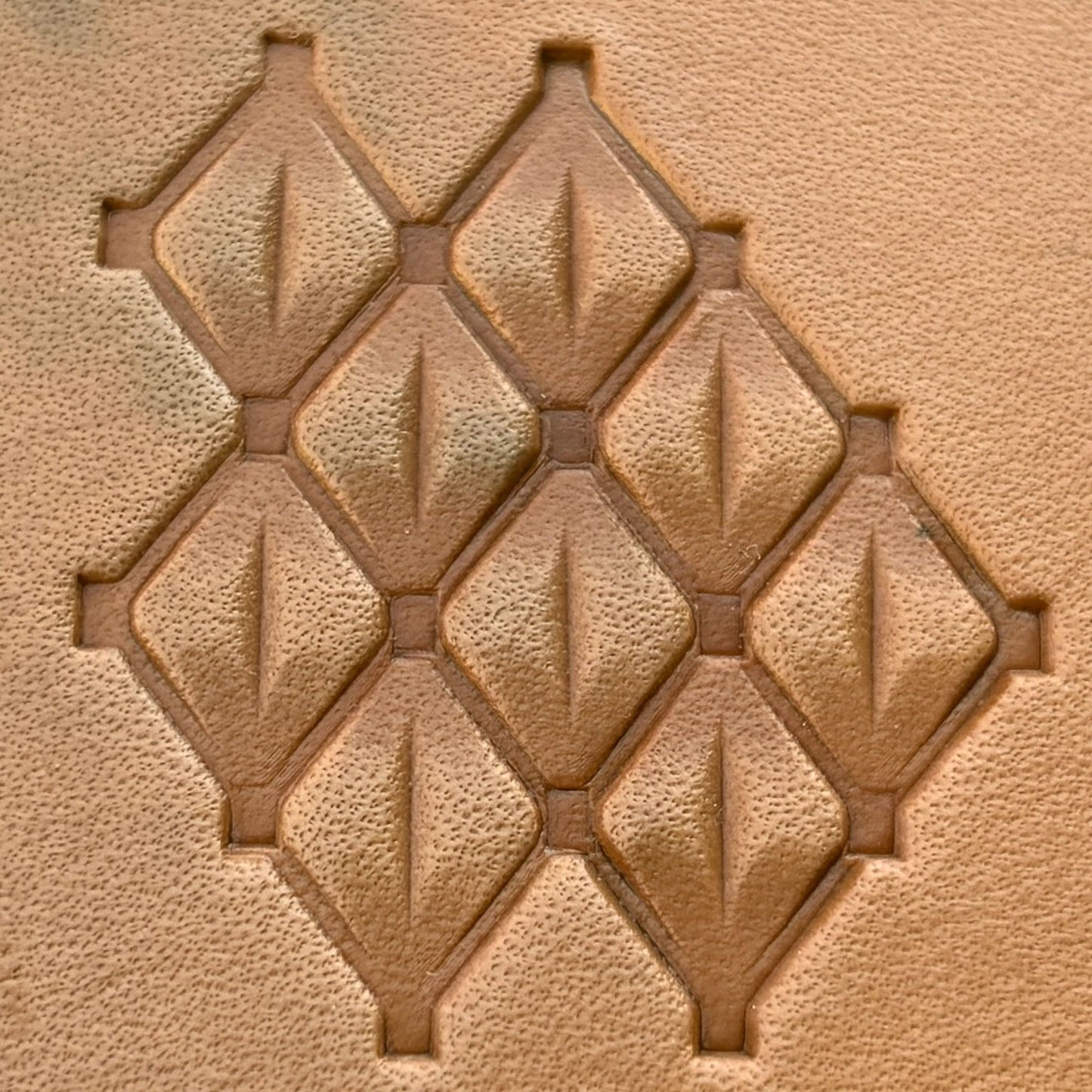 Geometric leather stamp LT025 — imprint on natural veg-tan leather