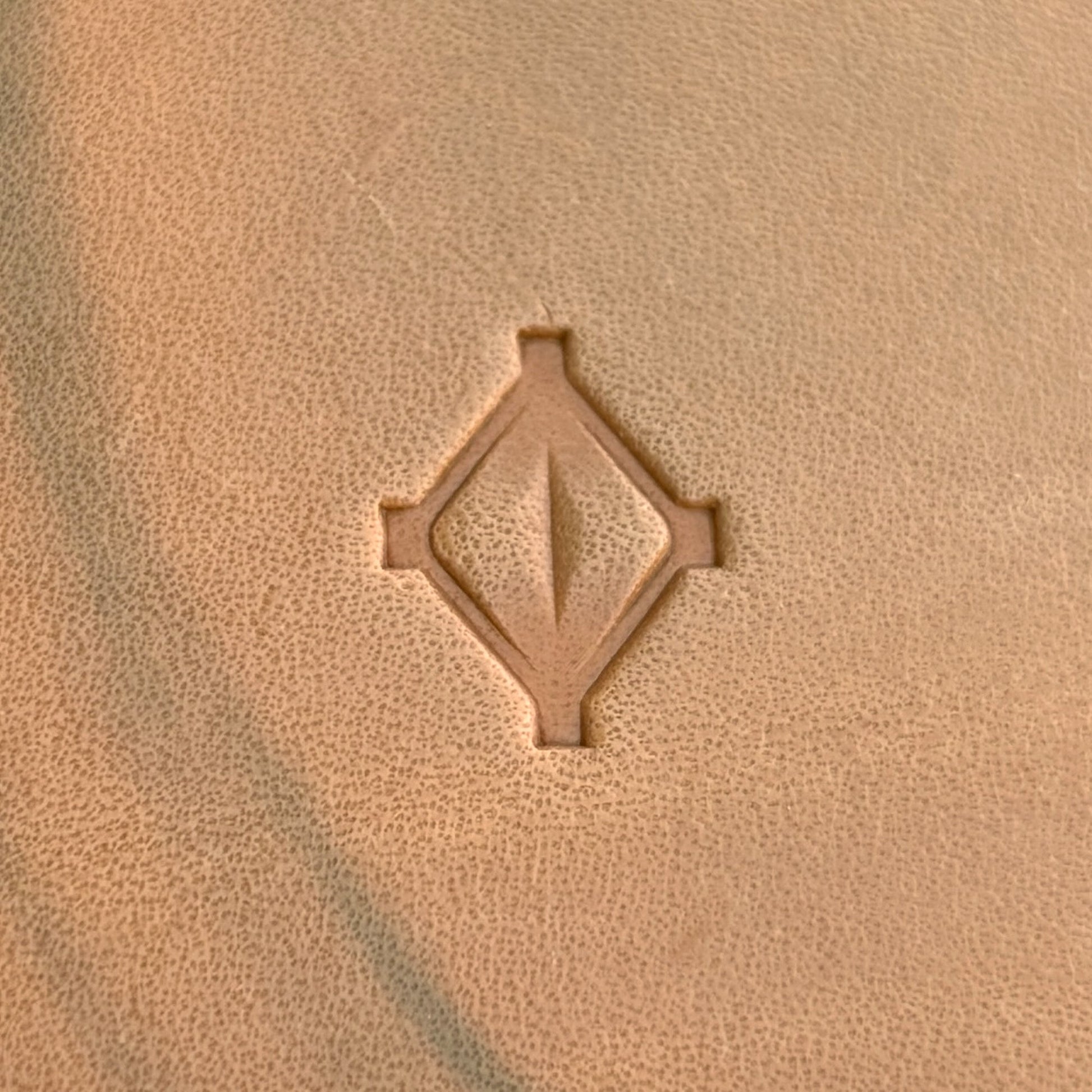 Geometric leather stamp LT025 — single impression on veg-tan leather