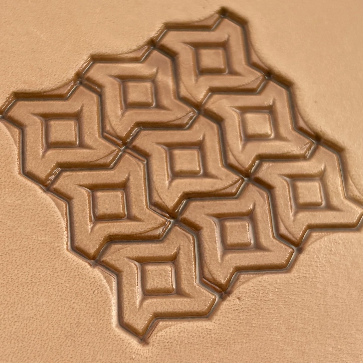 Geometric leather stamp LT026 — imprint on natural veg-tan leather