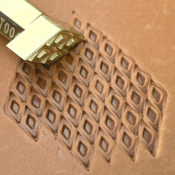 Diamond Grid Geometric leather stamp LT028 — brass stamping tool with imprint on natural veg-tan leather